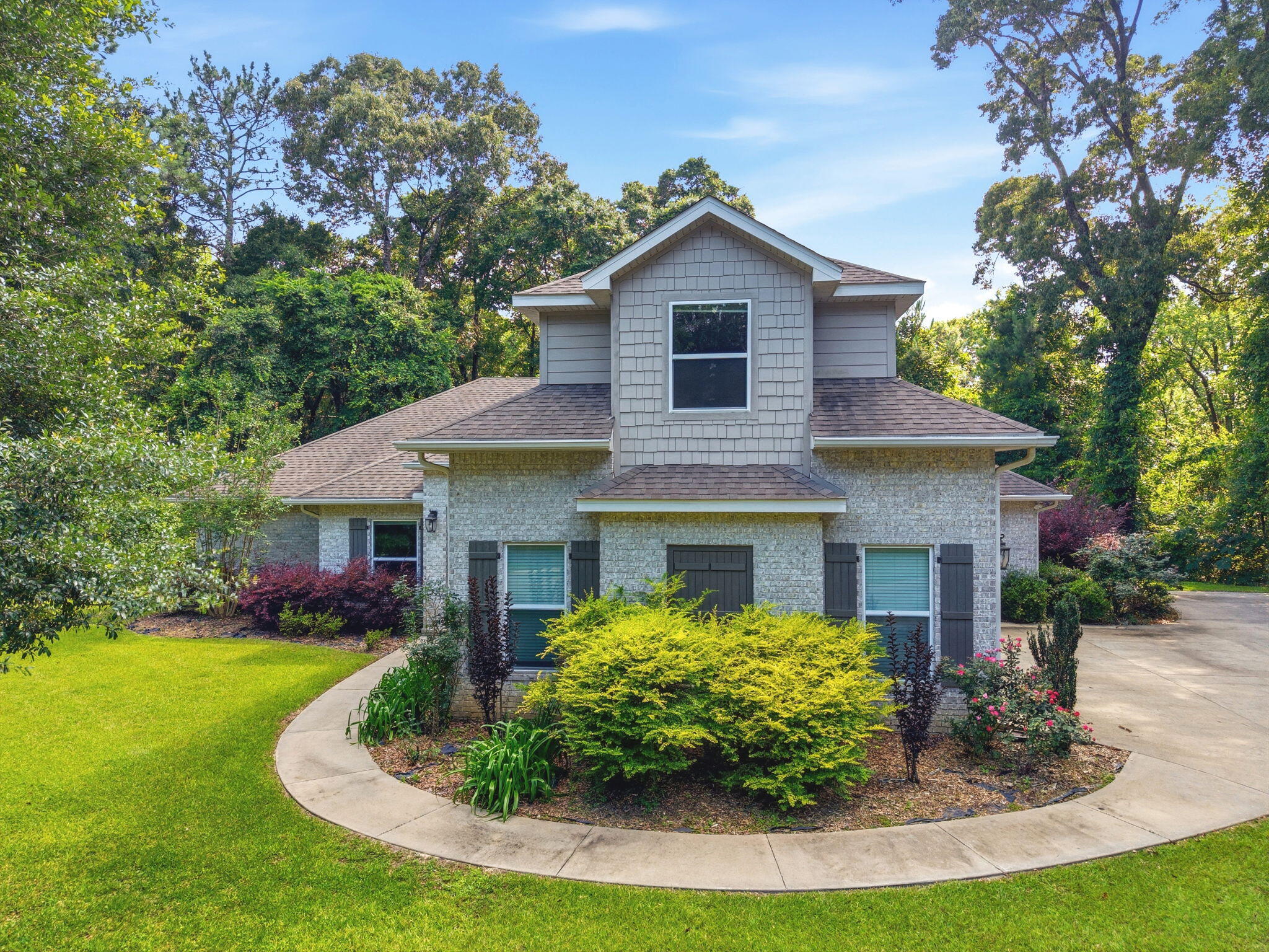 OPEN HOUSE SUNDAY, JULY 19 from 2-4pm.Welcome to Claire's Vineyard. This lovingly cared for 5 bedroom 3 bath house is ready for you to call it home. Situated in the very quiet, gated subdivision of Claire's Vineyard, this home boast a large open concept kitchen with granite countertops, copper double basin sink, gas cooktop, and stainless appliances. Down the hall is a stunning master suite, a second master suite on the second floor over the three car garage, and plenty of entertaining space at the rear of the home with room to add a pool if desired. Schedule your showing today!