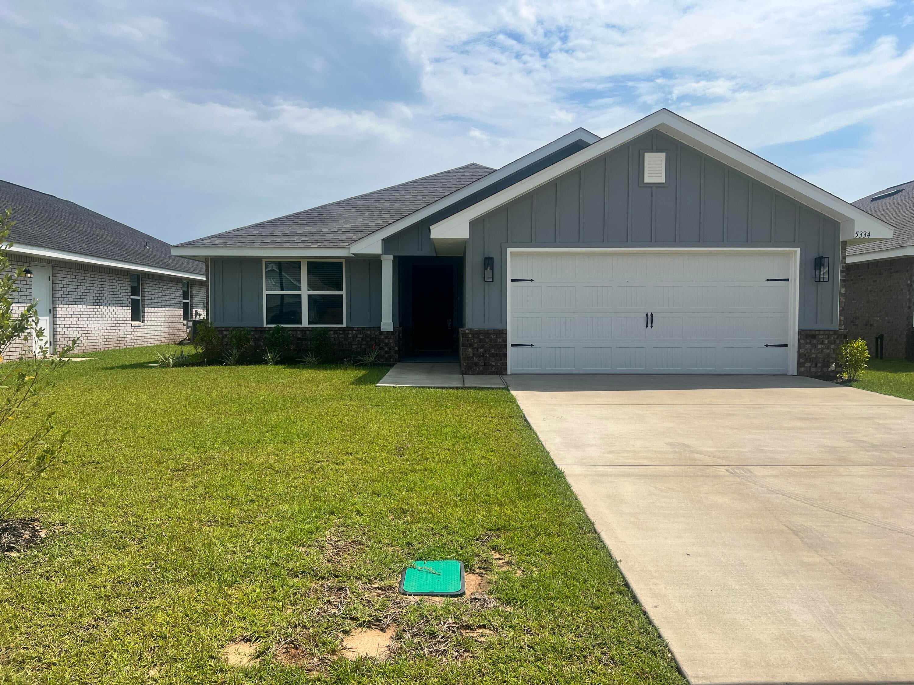 Welcome to HIDDEN PINES by Adams Homes. Located just 30 minutes to Navarre Beach, with close proximity to schools, shopping and much more. This home is 3-sided brick with Hardi design front, 2 car automatic SIDE ENTRY garage, sprinklers with timer, and a sodded yard with a landscaping package. Some upgrades that are being added to this home include granite/quartz countertops in kitchen and bathrooms, Puretec LVP flooring everywhere with carpet only in bedrooms, craftsman style elevation, garden tub and separate tiled shower in the master bathroom.