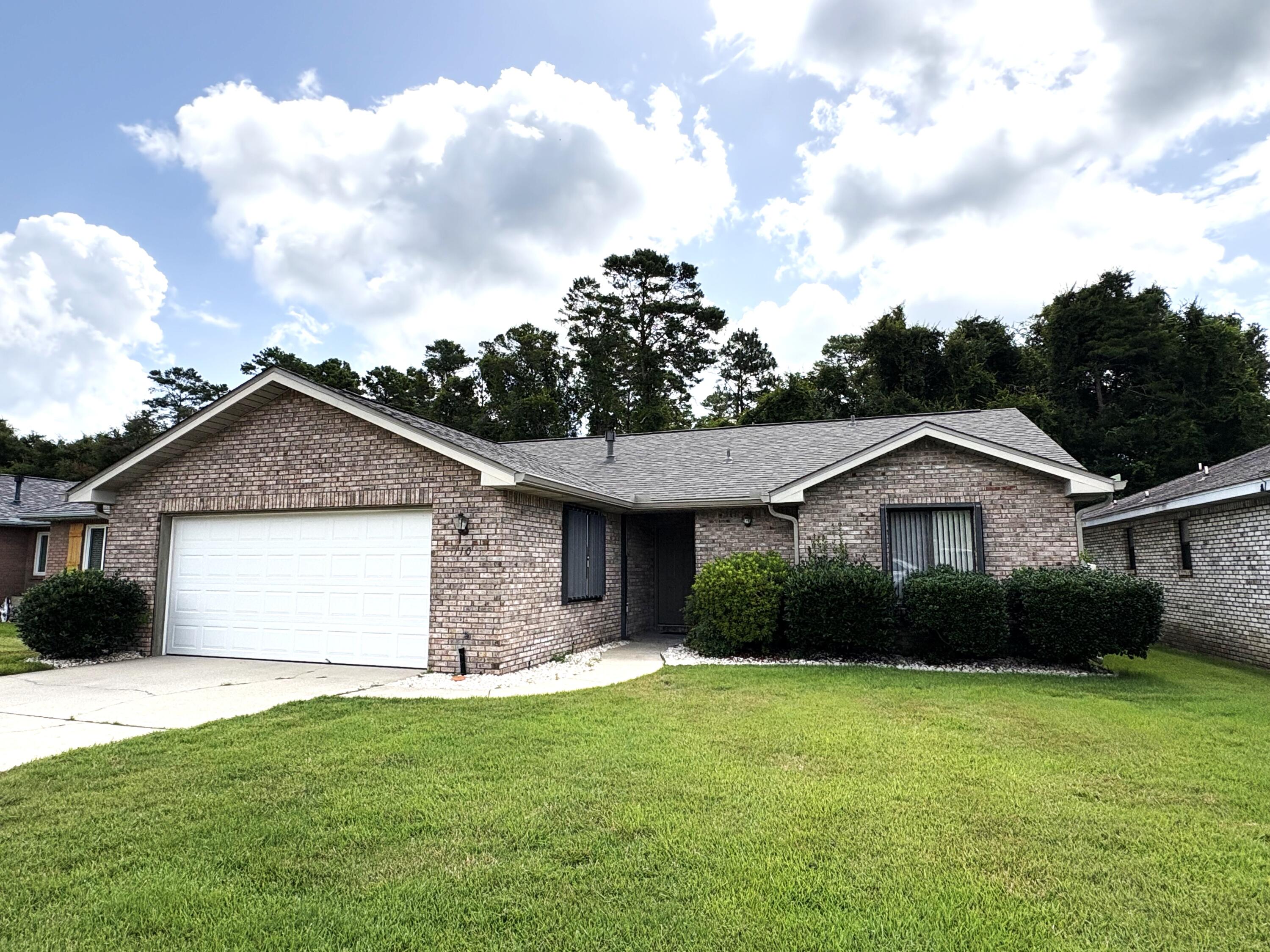 MOVE IN READY home on a quiet cul-de-sac street in the center of Niceville! this charming 2 bedroom/2 bath home offers an open floorplan with two living areas featuring a cathedral ceiling and low maintenance LVP flooring throughout.  The roomy back with a new fence backs up to a city owned greenbelt for added privacy. For peace of mind, there are accordion style hurricane shutters and the house has a termite protection system with terminix. Recent improvements include: water heater (2026), roof and gutters (2025), LVP flooring throughout (2020), insulation (2019), HVAC (2018) and new plumbing and a water filtration system (2016).  Dont wait...make this charming home yours today!!