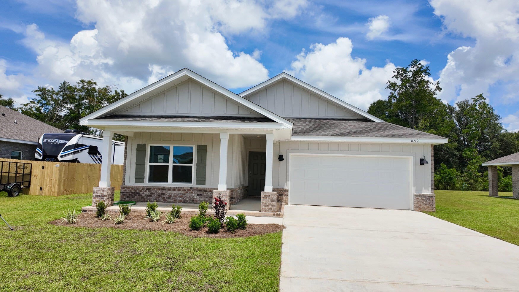 Welcome to Plantation Woods! The Creekside model is a spacious and desirable open concept floorplan, built-in lighting and a fabulous layout for relaxed living featuring 5 bedrooms, 3 bathrooms, 2-car garage, and the 'Smart Home Connect 'System with a variety of convenient Smart Home devices you will love. Spacious Great Room and dining area is open to the kitchen and lots of windows for natural lighting. The well-designed open kitchen includes stainless steel appliances, a smooth-top range, built-in microwave, quiet dishwasher, corner pantry, island bar, eye-catching wood-look flooring, stone countertops in the kitchen and baths, and plush carpet in the bedrooms. Fabric Hurricane door and window protection is also included. Call or text to schedule a tour today! ALL LISTING pictures, colors, features, and size may vary. Square footages are approximate.