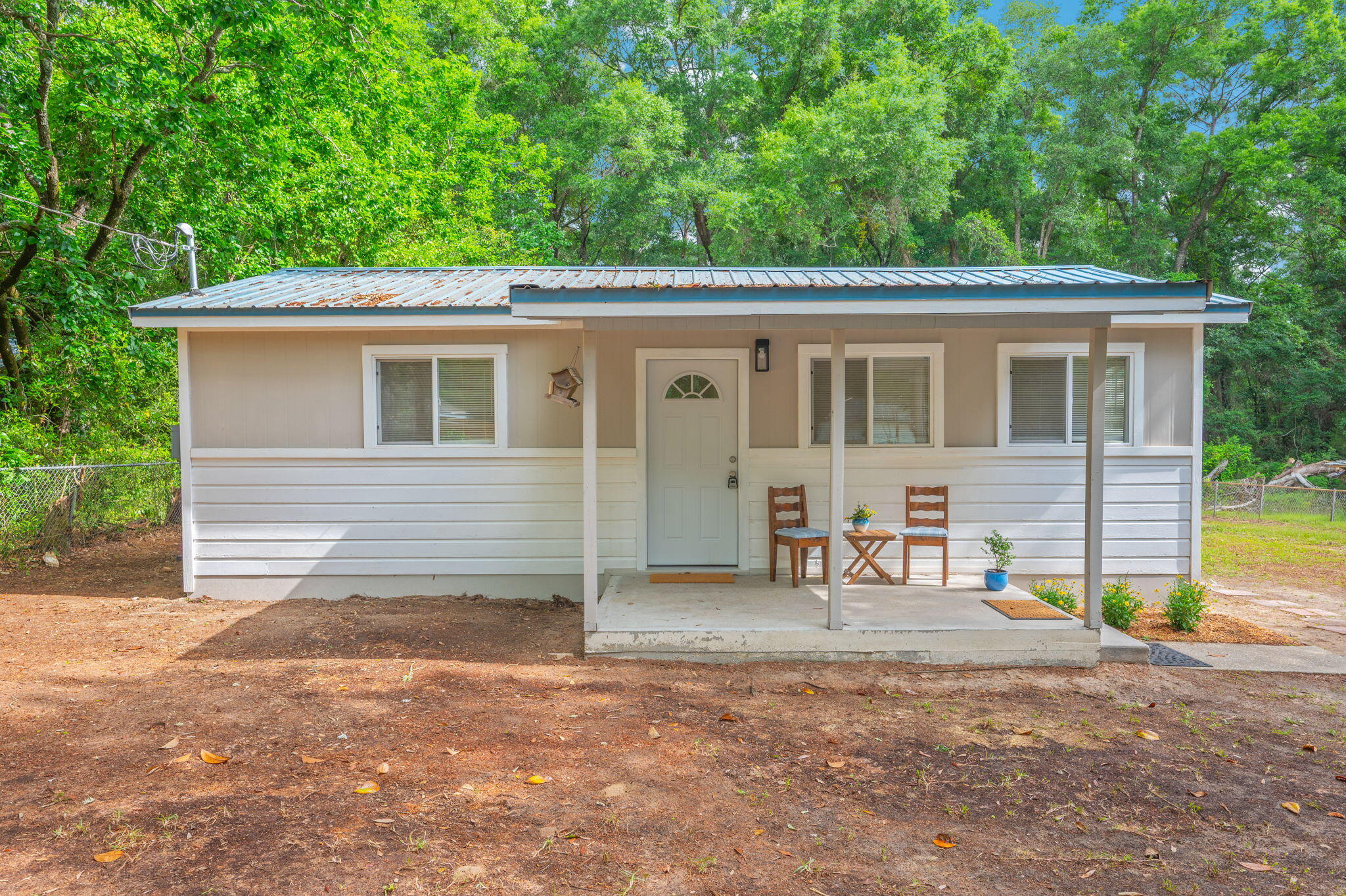 This freshly remodeled 2-bedroom, 2-bath home at 812 E Edney Ave in Crestview (32539) offers a clean, updated living space with beautiful hardwood floors throughout. The interior has been recently renovated to provide a modern yet comfortable feel, perfect for small families, couples, or individuals. Including a Master suit with private abthroom. Outside, you'll find a spacious, fully fenced yard that provides privacy and plenty of room for pets, entertaining, or relaxing. A brand-new storage shed adds extra convenience for tools or outdoor equipment. Located in a quiet area with easy access to local amenities, this home combines charm, functionality, and comfort in a desirable Crestview location.