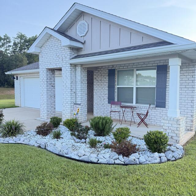 WELCOME to this well-maintained, beautiful brick home in one of Florida's lowest property tax counties!  Looking for a spacious home and lot with NO REAR neighbors located in a quiet, family friendly neighborhood? You will love this 4-bedroom 2-bath home that is decorated with NEUTRAL COLORS. Enjoy evenings inside near the cozy electric FIREPLACE with crackling sounds and heat OR sit in the SCREENED BACK PORCH with BLACKBERRY and GRAPE vines growing on a privacy trellis. Watch DEER and seasonal birds in your backyard. Maybe watch your kid(s) or pet(s) play in the SPACIOUS YARD or spend time at the COMMUNITY POOL.  Owners have completely remodeled the kitchen from a low builder grade room to an Amazing Gourmet Kitchen with a built in MICROWAVE and WALL OVEN (convection, air fryer and many more features), a built-in 5 burner cooktop, a Whirlpool fingerprint resistant French door fridge, solid wood SOFT-CLOSE cabinets with triple drawer sets and blanketed with a LOVELY GRANITE countertop.  Both bathroom vanities were upgraded with solid wood cabinets, soft-close drawers and MARBLE countertops.  A neutral LVP covers most of the house for easy cleaning. EXTRAS include a newer hot water heater, installed ceiling fans, a screened front door, board and batten wall features, SATIN painted walls for easy cleaning and a built-in DROP ZONE for shoes in the foyer.  The community also has a DOG PARK at the end of this CUL-DE-SAC. A+ Rated school district.
