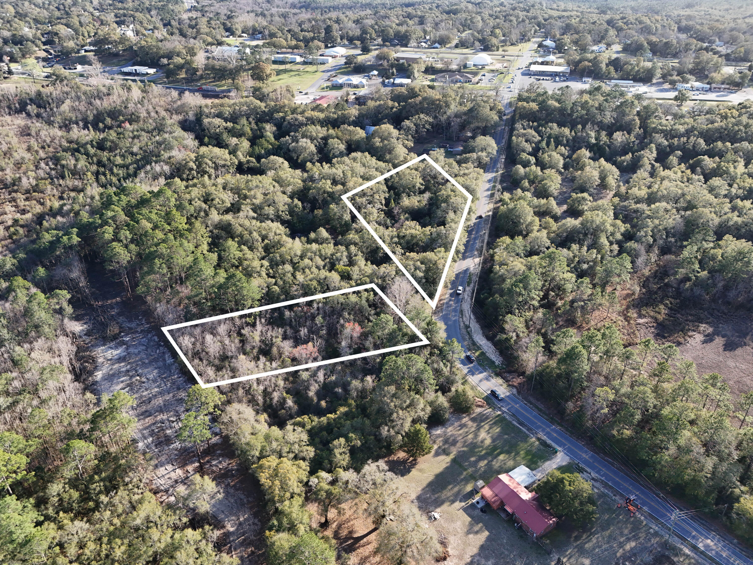 This 1.33-acre vacant land parcel in the City of DeFuniak Springs presents a versatile residential development opportunity. Zoned R2, the property allows for a range of residential uses including single-family homes, duplexes, townhomes, and multifamily dwellings with a potential density of up to 16 units per acre.

The site offers flexibility for builders, investors, or those seeking to subdivide and develop multiple residential lots. Additional permitted uses include professional offices, nursery schools, and certain institutional uses, with other possibilities available through special approval. Located within city limits, the property provides convenient access to local schools, shopping, and everyday amenities while maintaining the quiet character and natural surroundings that make DeFuniak Springs appealing. The combination of acreage, zoning flexibility, and location creates strong potential for both residential development and long-term investment.

Reach out today for more information.