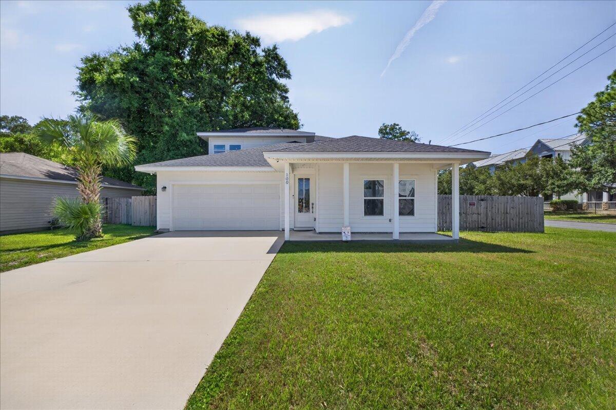 4.75% VA assumable rate available for qualified buyers with VA entitlement.  This stunning 2022-built home offers 4 bedrooms, 3 bathrooms, and modern coastal living!
Situated on a corner lot, the covered front porch and crisp white exterior set the tone for what's inside. Step through the front door and into a bright, open-concept living and dining area featuring luxury vinyl plank flooring throughout and an abundance of natural light.
The kitchen is sure to impress, boasting white shaker cabinetry with crown molding, quartz countertops, a large kitchen island with sink and breakfast bar, stainless steel appliances, and stylish pendant lighting -- all open to the main living area and perfect for entertaining.
The primary suite is conveniently located on the main floor and features a spacious walk-in closet and a spa-like ensuite bath complete with a double vanity, quartz countertops, brushed gold fixtures, and a stunning oversized walk-in shower adorned with floor-to-ceiling marble-look tile, dual showerheads, built-in niches, and hexagon mosaic tile flooring.
Upstairs, you'll find a bright, open den area -- ideal as a home office, playroom, or flex space -- along with two additional bedrooms, each with ample closet space and LVP flooring. A secondary bathroom with quartz countertops and a tub/shower combo serves the upper level. Out back, enjoy a large fully fenced backyard with a covered patio, and firepit. A 2-car attached garage completes this gorgeous home.
Ideally situated with an easy commute to local military bases, gorgeous white sand beaches, downtown Fort Walton Beach, and an array of restaurants and shopping.