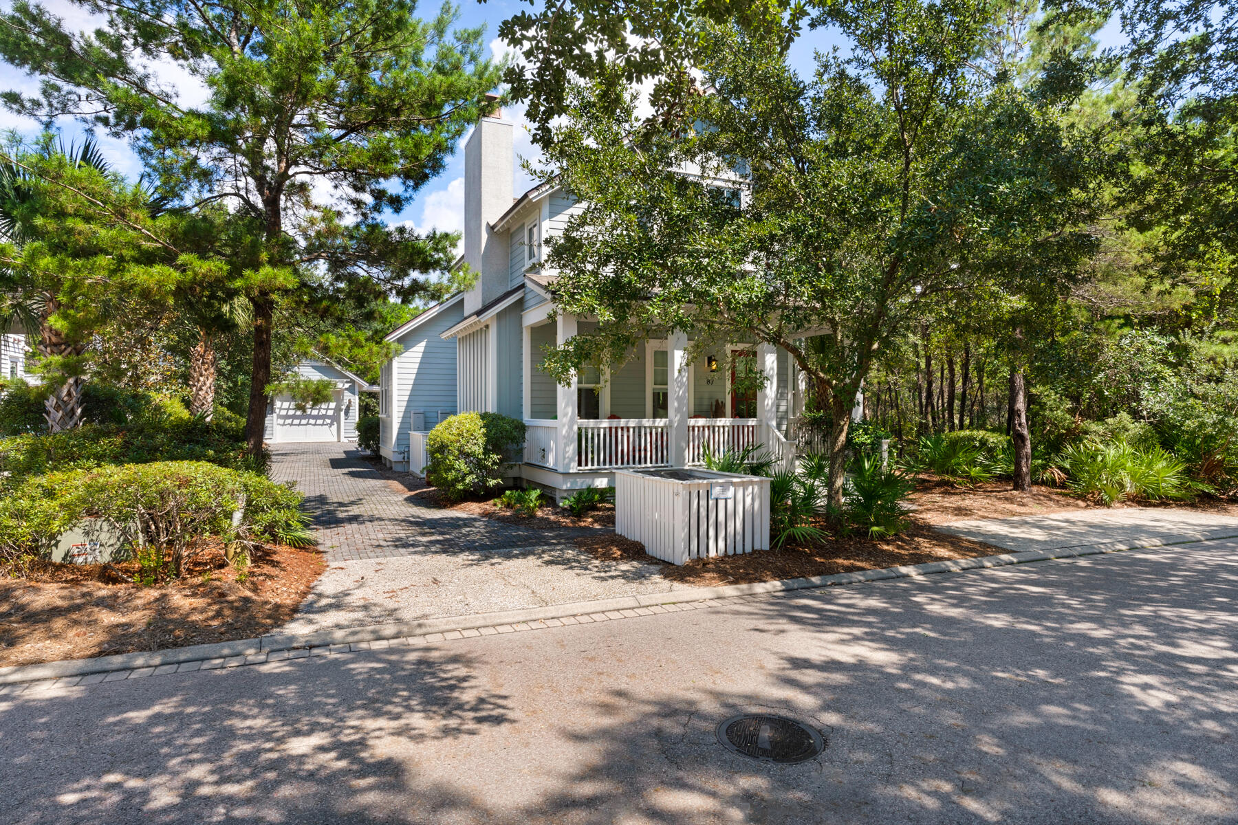 Welcome to 87 Salt Box Lane, a charming coastal retreat located within the gated community of WaterSound Beach. Perfectly positioned directly across from Signal Park, this home sits on a spacious lot with abundant outdoor living space designed for relaxing and entertaining.  The thoughtfully designed floor plan features aa desirable first-floor primary suite complete with a spa-like bath, including a walk-in shower and classic clawfoot soaking tub. The chef's kitchen is beautifully appointed with high-end appliances, designer lighting, and custom finishes, opening seamlessly to a  light-filled dining area and an inviting living room anchored by a tabby shell fireplace, pecky cypress accents, and sophisticated coastal decor. Multiple outdoor living spaces-included covered front and rear porches and a screened porch just off the kitchen create the perfect setting for enjoying the Gulf breeze. A detached one car garage add convenience and charm.
Offered fully furnished with an established rental history, this home is both  an exceptional retreat and a strong investment opportunity. 
Residents of WaterSound Beach enjoy exclusive amenities including a beachside pool and over a mile of private pristine  Gulf front shoreline.
