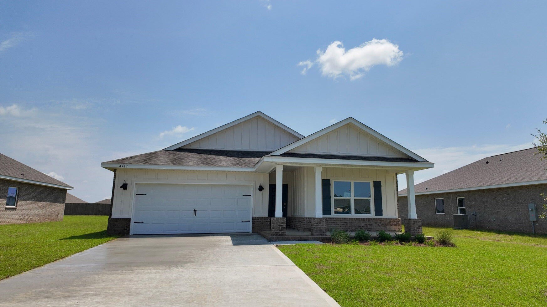 Welcome to Plantation Woods! The Creekside model is a spacious and desirable open concept floorplan, built-in lighting and a fabulous layout for relaxed living featuring 5 bedrooms, 3 bathrooms, 2-car garage, and the 'Smart Home Connect 'System with a variety of convenient Smart Home devices you will love. Spacious Great Room and dining area is open to the kitchen and lots of windows for natural lighting. The well-designed open kitchen includes stainless steel appliances, a smooth-top range, built-in microwave, quiet dishwasher, corner pantry, island bar, eye-catching wood-look flooring, stone countertops in the kitchen and baths, and plush carpet in the bedrooms. Fabric Hurricane door and window protection is also included. ALL LISTING pictures, colors, features, and size may vary. Square footages are approximate.