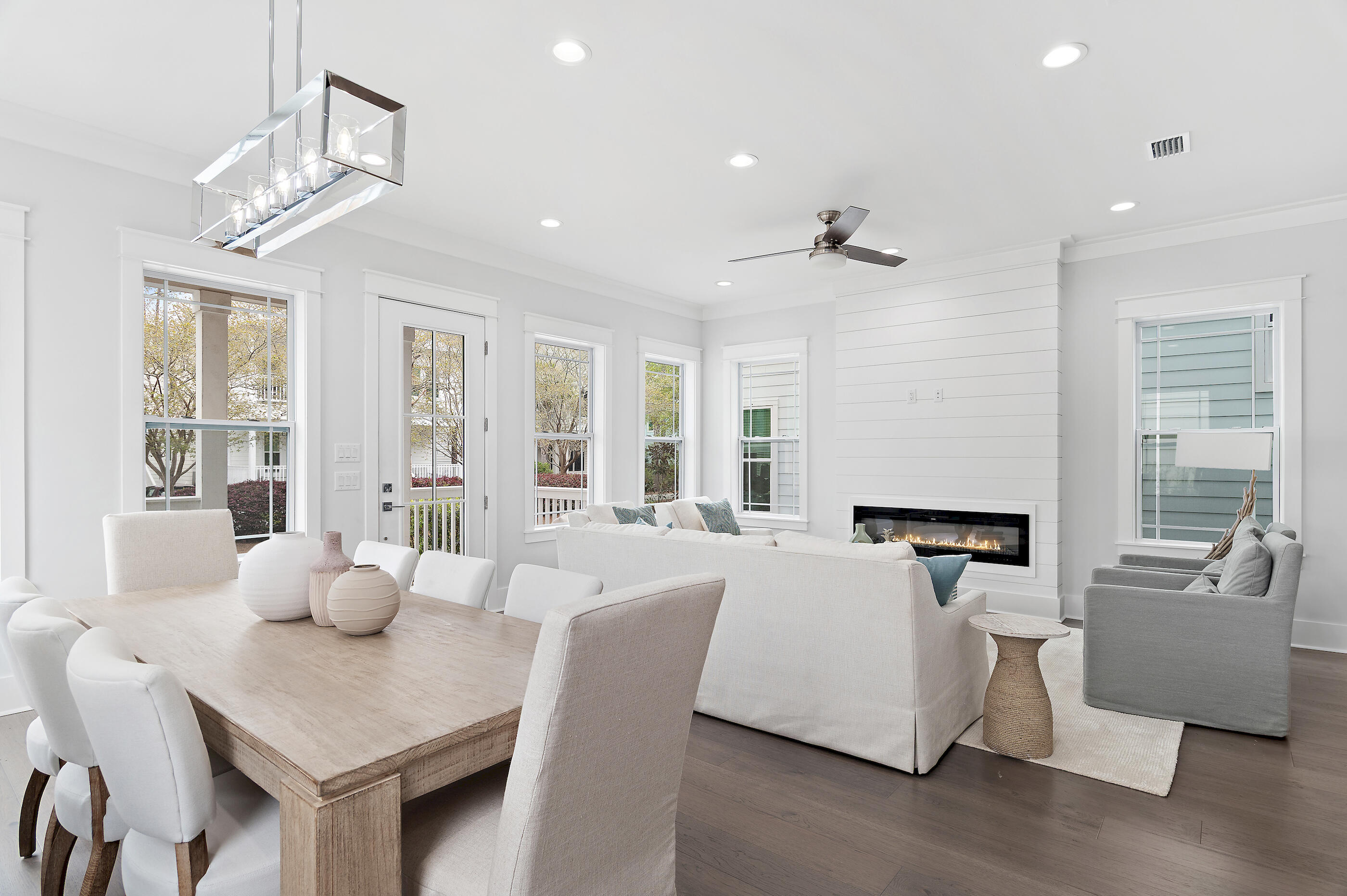 Welcome to 171 Redbud Lane, a beautifully crafted 2025 beach cottage in Treetop Village in Inlet Beach, where timeless coastal elegance meets modern luxury along sought-after Scenic Highway 30A. Designed with both sophistication and comfort in mind, this five-bedroom home--with the potential for a sixth bunk room--offers an exceptional living and investment opportunity in one of 30A's premier gated communities. Inside, refined finishes set the tone: shiplap walls, engineered hardwood flooring, soaring ceilings with crown molding, and curated designer furnishings. Quartzite and ceramic tile accents, custom closets throughout, and stainless steel appliances elevate the home's style and functionality. The open-concept kitchen, living, and dining area forms the heart of the home, ideal for entertaining. Quartz countertops, generous natural light from double-pane windows, and seamless access to expansive covered porches create a bright and welcoming atmosphere. With approximately 450 square feet of covered porch space--including four private balconies and a screened porch overlooking the pool--there are countless opportunities to enjoy the coastal breeze.
Thoughtfully arranged sleeping accommodations maximize both comfort and privacy. The first level features a private king suite with an ensuite bath and separate entrance, perfect for guests. The second-level primary suite offers a luxurious ensuite bath and its own private balcony. On the third level, two additional king bedrooms and a spacious bunk room with four full beds provide ample space for family and friends. Four of the bedrooms open directly onto balconies, extending the living experience outdoors.
What truly sets this home apart is each level has it's own separate living area, and its rare combination of features within Treetop Village: a downstairs bedroom, potential for six total sleeping rooms, four dedicated parking spaces plus golf cart parking, engineered waterproof flooring, and a high-efficiency air-to-heat pump system. Positioned on a desirable corner lot just steps from the community pool and tram stop, the home also includes a gas hookup for grilling and effortless access to the neighborhood's amenities.
Located within a gated enclave with entrances from both Scenic Highway 30A and Highway 98, Treetop Village offers deeded beach access to the Gulf via tram service just beyond your back door. You're moments from the 170-foot resort-style pool and outdoor shower, and minutes from the dining and shopping of 30Avenue. Ideally situated near Rosemary Beach, Alys Beach, and Seacrest Beach, this home delivers both privacy and proximity.
Turnkey and thoughtfully appointed, this is more than a beach cottage--it's a refined coastal retreat designed for luxurious living, effortless entertaining, and unforgettable moments along 30A.