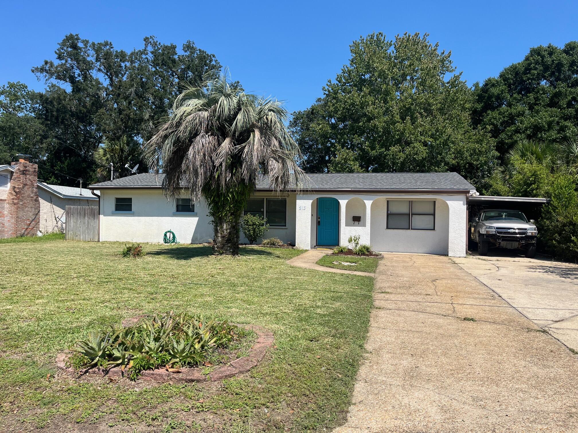Welcome to this 3/BR, 1-bath cottage full of personality and tucked into a peaceful setting.  Has a converted garage for a 2nd living area.  Enjoy your morning or evening coffee in the enclosed Florida room or the covered back deck listening to the bird sing.   The backyard feels like your own private escape and is perfect for weekend barbecues, gardening, or entertaining. fruit trees and a grapevine add beauty and seasonal bounty.  A  shop with power can be used as a man cave, workshop, or storage.  Got chickens?  We got you covered!  Chicken coop included!  Collect your fresh eggs in the morning and unwind under the trees in the afternoon. This home offers a sweet slice of laid-back living. 4-Point inspection included.  Seller also has a survey from 2021.  Roof replaced in 2021, 3-ton HVAC and and main truck duct work done in 6/24, HWH replaced in 2023 and connectors and main pipes refitted in 2025, all electrical was replaced in 2021,  Plumbing partially re-piped in the last 5 years (fixtures and supply stop/lines).  In ground sprinkler system included.  Whole home generator also included (not currently working, may just need servicing.