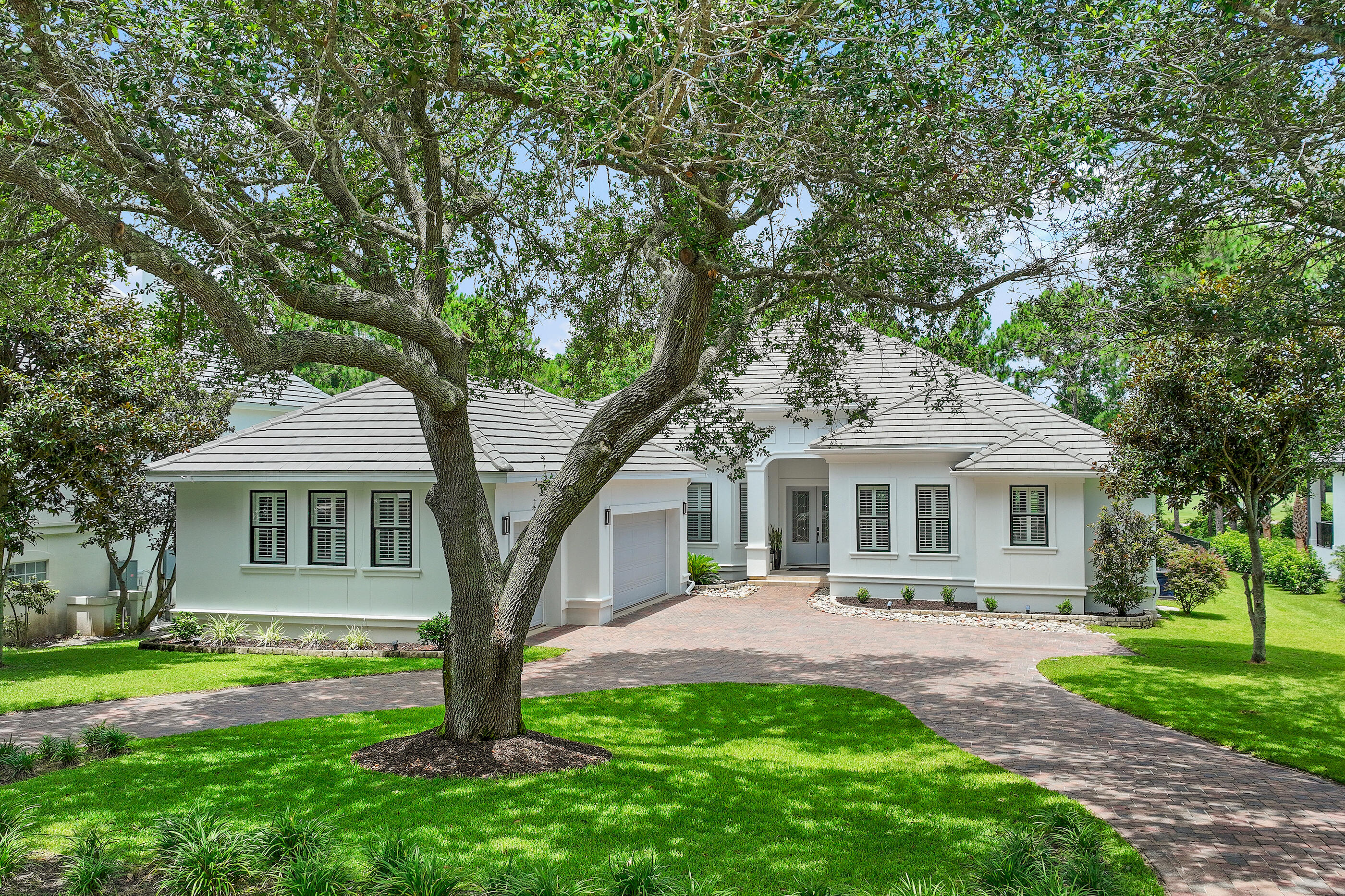 Welcome to 440 Regatta Bay Blvd, a beautiful single-level home located within the prestigious, gated golf course community of Regatta Bay. Situated on a golf course lot, this extensively renovated residence offers the ideal blend of luxury, functionality and relaxed coastal living. Spanning approximately 3,644 square feet of living space, this thoughtfully designed home features 5 bedrooms, 3.5 bathrooms and an expansive open-concept floor plan. With extensive renovations completed between 2019-2026, this property has been meticulously enhanced with high-end finishes, modern systems and designer touches throughout. From the moment you arrive, the home makes a striking impression with beautiful, updated landscaping, fresh exterior paint and a welcoming entry that reflects the quality found inside. A climate controlled 3-car garage provides multi-functional use, ample parking, plenty of storage and a Level 2 EV charging port. Step through the front door into a light-filled interior where high ceilings, updated finishes and an open layout create a sense of comfort and sophistication. The heart of the home is the chef-inspired, fully updated customized kitchen. This showstopping space features custom cabinetry, an island with a prep sink, leathered granite countertops and a large ceramic farmhouse sink. A professional-grade 48-inch gas range with double ovens anchors the space, making it ideal for entertaining! Adjacent to the kitchen, the spacious living area serves as a central gathering place, enhanced by a newly installed designer fireplace that adds warmth and a modern focal point. The primary suite is a true retreat. The renovated ensuite bath reflects a spa-like aesthetic, featuring a beautifully retiled walk-in shower, a new double vanity and updated finishes. Four additional bedrooms provide exceptional flexibility for family, guests, or work-from-home needs. One bedroom includes its own ensuite bath, offering privacy ideal for guests or multigenerational living. Additional updates to both the ensuite and powder bath ensure consistency in design and quality throughout the home. Step outside to experience one of the property's most compelling features, the private outdoor oasis. A custom heated saltwater pool, completed with a screened enclosure and paver decking, creates the perfect environment for year-round enjoyment. Whether you're hosting poolside gatherings, enjoying quiet evenings under the lanai or soaking in the Florida sunshine, this space is designed for both relaxation and entertainment. The large, fully fenced backyard is a rare find within a golf course setting, offering both privacy and space--ideal for pets, play or future customization. Beyond the fence line, the home enjoys peaceful golf course views. This property has also been significantly upgraded with major system improvements, providing peace of mind for years to come. Highlights include a new HVAC system, a tankless water heater for energy efficiency and endless hot water and updated interior and exterior paint. Regatta Bay is a serene, gated community that seamlessly blends golf and boating, offering a lifestyle that is truly unparalleled! The essence of the Regatta Bay Lifestyle revolves around convenience, allowing residents to easily access numerous enjoyable destinations within minutes via golf cart, including the beach! Within the community, residents can indulge in golf, swimming, tennis, pickleball, parks, playgrounds, the Regatta Bay Clubhouse, Legendary Marine, and Legendary Yacht Club. Furthermore, Regatta Bay features a private road that leads directly to the Destin Commons, where an array of popular retail stores for both men and women awaits, alongside a diverse selection of restaurants, Whole Foods, Bass Pro, Lowes, an AMC movie theater, and Uncle Buck's Bowling-all easily reachable by golf cart. Regatta Bay is centrally located offering easy access to the airport and only a few miles from Northwest Florida's finest hospital. Schedule your private tour today and experience the elegance of Regatta Bay living.