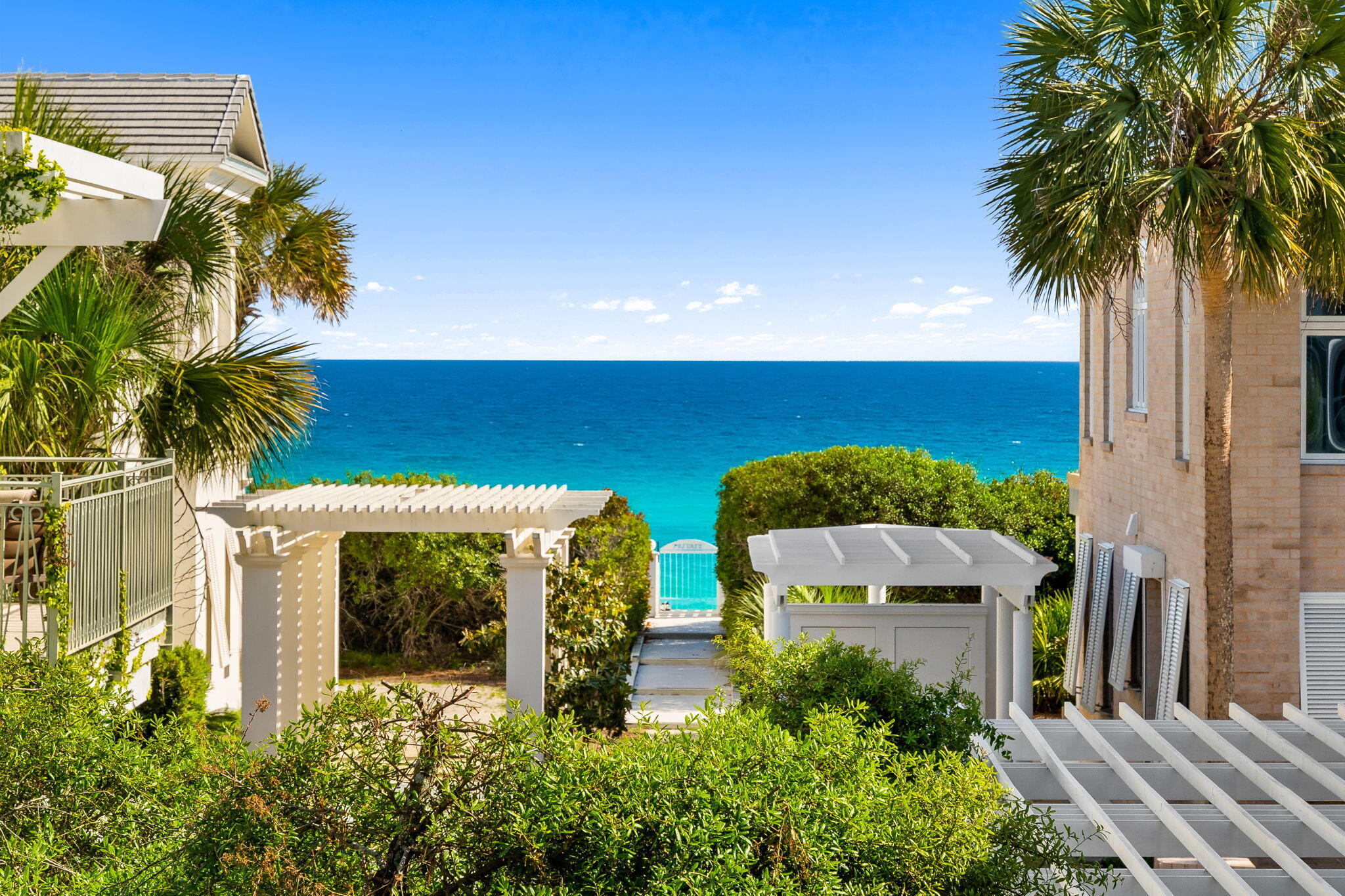 Located in a private gated community on the south side of 30A with 267 ft of private beach frontage, this stunning new construction home offers refined coastal living just steps from the Gulf. Designed by renowned architect Tim McNamara, this two-story residence blends timeless architecture with modern functionality in a highly sought after setting.

The heart of the home features a spacious living room, designer kitchen, and dining area, all capturing beautiful Gulf views that create a serene, elevated coastal atmosphere. The chef's kitchen is complemented by high-end finishes, a large island, and ample storage, making it as functional as it is beautiful.

The primary suite is conveniently located on the first floor featuring Gulf views, creating a relaxing retreat. Convenience meets luxury with an elevator as well as a garage for secure parking and storage. Every detail reflects quality craftsmanship and thoughtful design.

Jasmine Dune offers two pools and access to a one-bedroom community guest house, available up to four weeks per year, with three dedicated parking spaces.

Ideally situated less than one mile from Seaside, this home offers easy access to dining and shopping making it the perfect blend of location, luxury, and lifestyle along 30A.