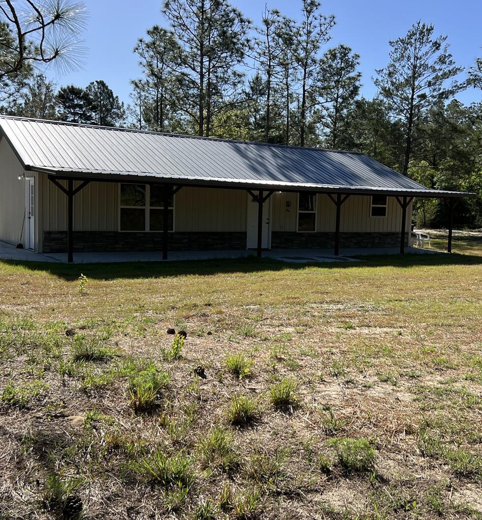 Built in 2025, 1.1 acres. 1 bedroom, flex/office, 2 baths.