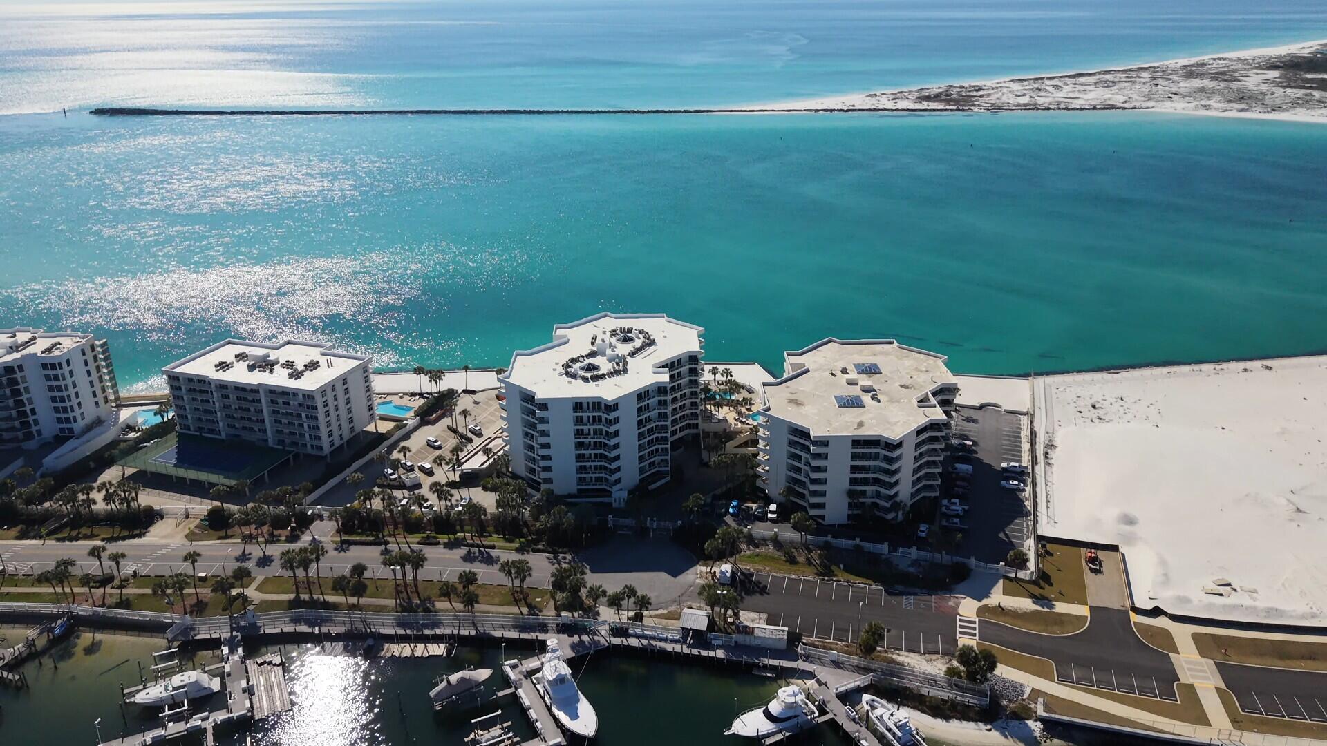From the moment you walk in you'll fall in love with this beautiful & affordable Coastal Inspired Condo with its view of Destin Harbor, High-End Finishes & Large Balcony! Unit 126 is conveniently located to all the key amenities (Private Beach, Pool, Fitness Center, Club Room, Private Covered Parking Space & Personal Storage Unit) to provide an excellent 'Quality of Life'. East Pass Towers looks great and is in outstanding shape having just completed a major renovation with all assessments being paid for by the current owner. The Complex is gated/fenced for security with beautifully landscaped grounds. Looking for an easy Florida Lifestyle? You've found it! Come see it today...make it yours... and love it forever!!