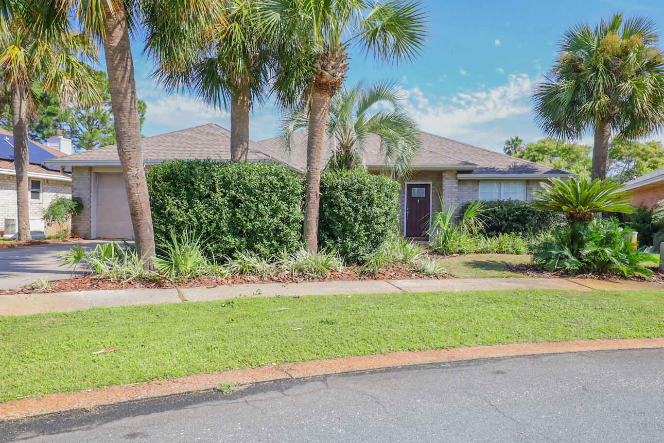 A perfect blend of convenience and peace, tucked away on a cul-de-sac in the Indian Lake subdivision just off Commons Drive. An open floor plan with high cathedral ceilings welcomes you inside. Stainless steel appliances, and granite countertops in the kitchen with a breakfast bar that looks out to the screened back porch over the luscious landscaping, and outdoor patio. 
A new roof was installed in 2021, HVAC in 2024, hot water heater, and new irrigation pump in 2025.