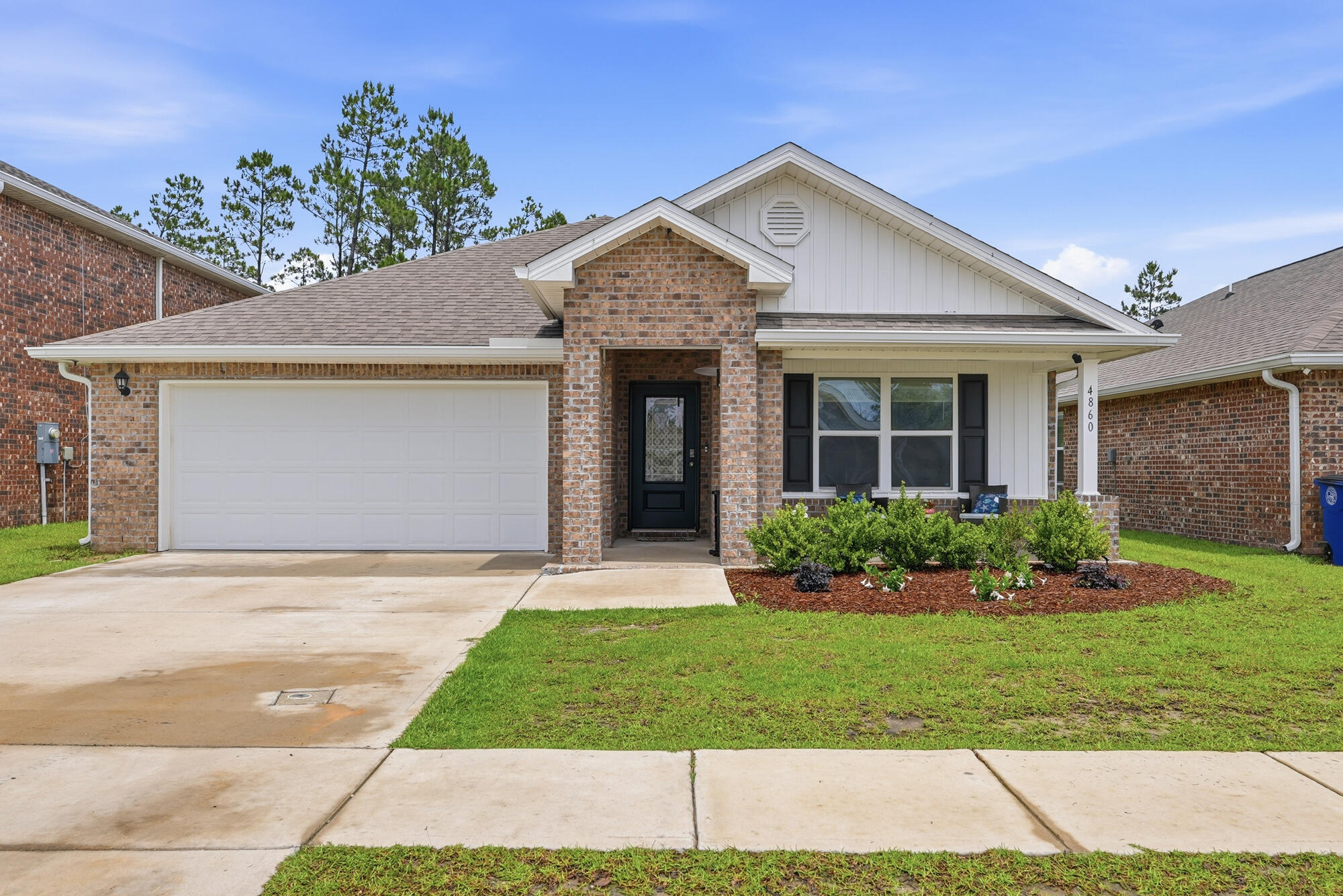 SELLER OFFERING UP TO $5,000 IN CLOSING COST ASSISTANCE WITH A FULL PRICE OFFER! How would you like to not only have a new house but to also have a COMMUNITY PLAYGROUND? That's right, this house in a neighborhood that features TWO CLUBHOUSES that includes a FITNESS CENTER, POOL, TENNIS COURT, BASKETBALL COURT, and PLAYGROUND.

While we know that there are plenty of new construction homes available, you can have this FOUR BEDROOM and TWO BATH house at 1,827 square feet (per property appraiser site) for a LOWER PURCHASE PRICE than an average new build in this neighborhood at similar square footage. If that is not enough, the home features a CALI FLOOR PLAN featuring an open common area including the KITCHEN, LIVING ROOM, and DINING while preserving some privacy with the BEDROOMS being located towards the front of the house, except the MASTER SUITE.

The KITCHEN features an ISLAND with cabinets throughout the kitchen space along with a GLASSTOP STOVE, BUILT IN MICROWAVE, DISHWASHER, and PANTRY.

The MASTER SUITE features a MASTER BEDROOM and a MASTER BATHROOM with DOUBLE VANITIES, GARDEN TUB, WALK-IN SHOWER, and WALK-IN CLOSET.

Other features include a TWO CAR GARAGE, A FRONT PORCH, and BACK PORCH along with the backyard facing the woods for more privacy.

COME GET YOUR LIBERTY HOME FOR LESS TODAY!