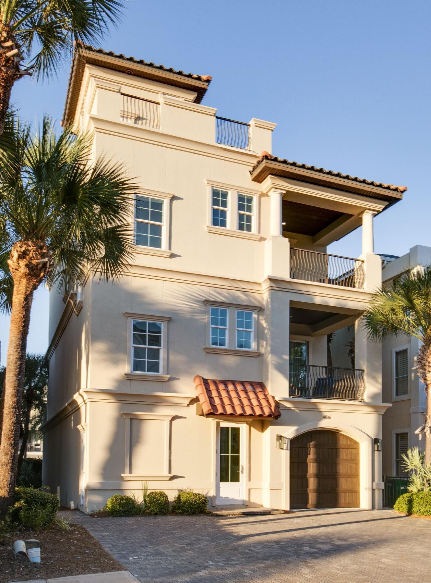 Priced below current appraisal!    This stunning coastal retreat located in the exclusive gated beachfront community of Destiny by the Sea offers the perfect blend of luxury, space and beachside convenience.  This home has undergone a complete renovation including all New Furnishings, air conditioner, water heater, flooring, cabinetry, appliances, lighting and paint.  At the heart of the home is a chefs kitchen featuring a massive island - perfect for entertaining.  A second living room on the first floor along with two master suites with walk in shower and soaking tubs add privacy, making this home perfect for multiple families.  Experience endless outdoor living with five private balconies plus a sprawling rooftop deck showcasing panoramic views.  Additional features include an elevator. Destiny by the Sea with its community pool, private deeded beach access and 24 hour security make it the most sought after vacation destination on the coast.  Whether you're looking for a private beach retreat or a high-performing rental investment, this exceptional home delivers on all fronts in one of Destin's most coveted communities.
