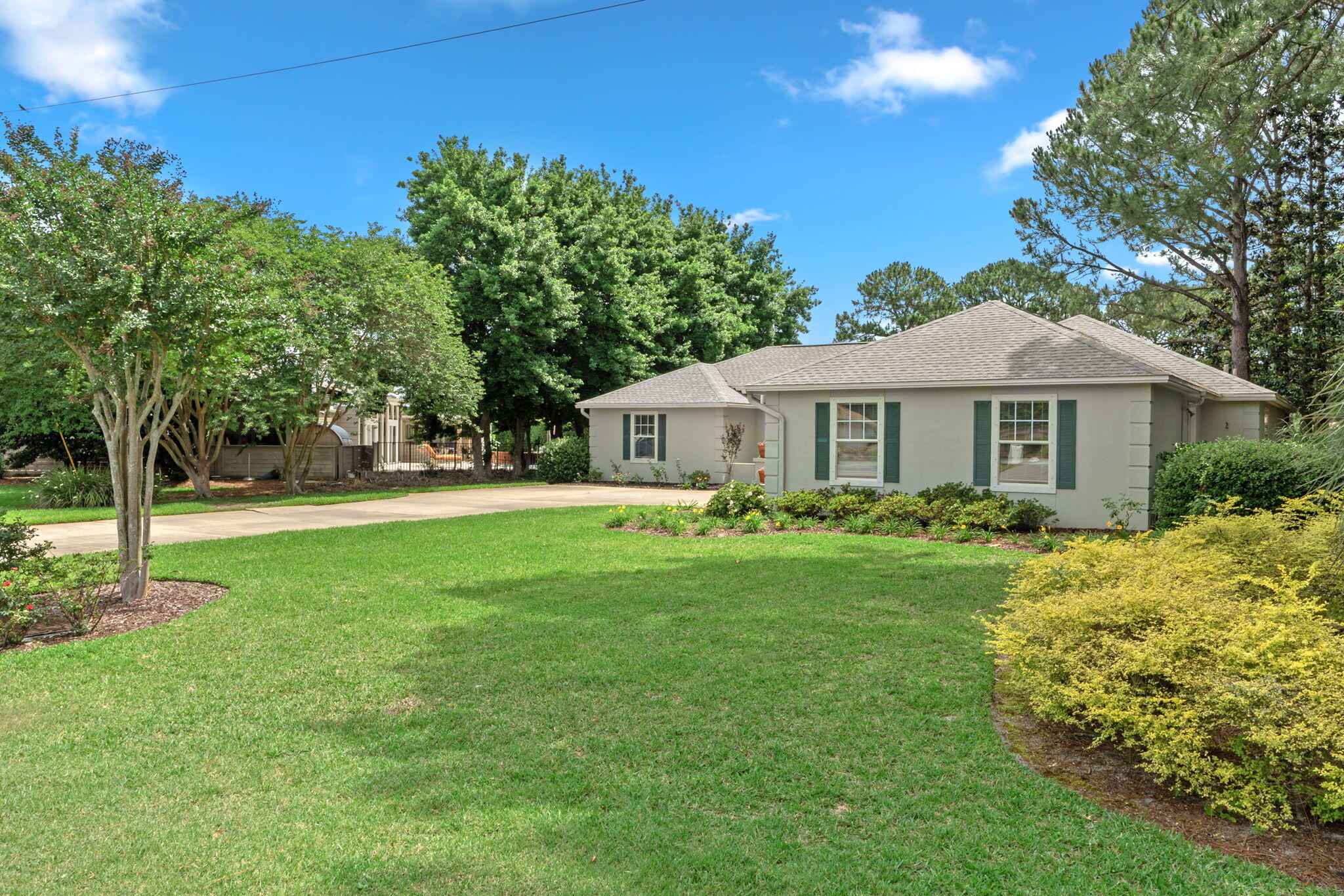 It's not very often that a ONE LEVEL home with an attached TWO CAR garage comes to the market after being enjoyed by one set of owners for over 20 years! An exceptional opportunity to own a well maintained Sandestin home sitting on nearly 1/3 acre on the Links GC that provides access to  all the amenities that are offered within Sandestin without ANY HOA. 

***ESTATE SALE being conducted May 1-2, Sellers moving truck arrives May 6th.
  A blank canvas awaits to make it your own! Home boasts 3 bedrooms, 2.5 baths, screened porch and is perfect as a second home, nightly rental, or permanent home. Bring your RV's, boats and toys with you! Sandestin Golf and Beach Resort features more than seven miles of beaches and pristine bay front, four championship golf courses, 15 world-class tennis courts, pickleball courts, 108 catch and release ponds stocked with bass (no fishing license required), a 226-slip marina, a fitness center, spa and celebrity chef dining. Shop, dine and play at the charming pedestrian village, The Village of Baytowne Wharf and more. Inside the gates of the resort, there are 4564 constructed residences located within 72 distinctly different neighborhoods. Residents enjoy a balanced lifestyle, 24 hour gated security, world class amenities within the 2,400 acres spanning from the beach to the bay. Everything within the gates of the resort is accessible by golf cart or bicycle. The entire resort is interconnected by miles of pedestrian, bike and golf cart paths that weave through groves of live oaks, meandering past natural lagoons, fountains, man-made lakes, and meticulously landscaped fairways.
Just beyond the gates, Grand Blvd, with its weekly farmers market, varied events and superb section of dining and shopping is readily accessible by golf cart. The Market Shops, on the south side of highway 98, boasting more dining and shopping choices, is easily accessible utilizing the tunnel beneath Hwy 98