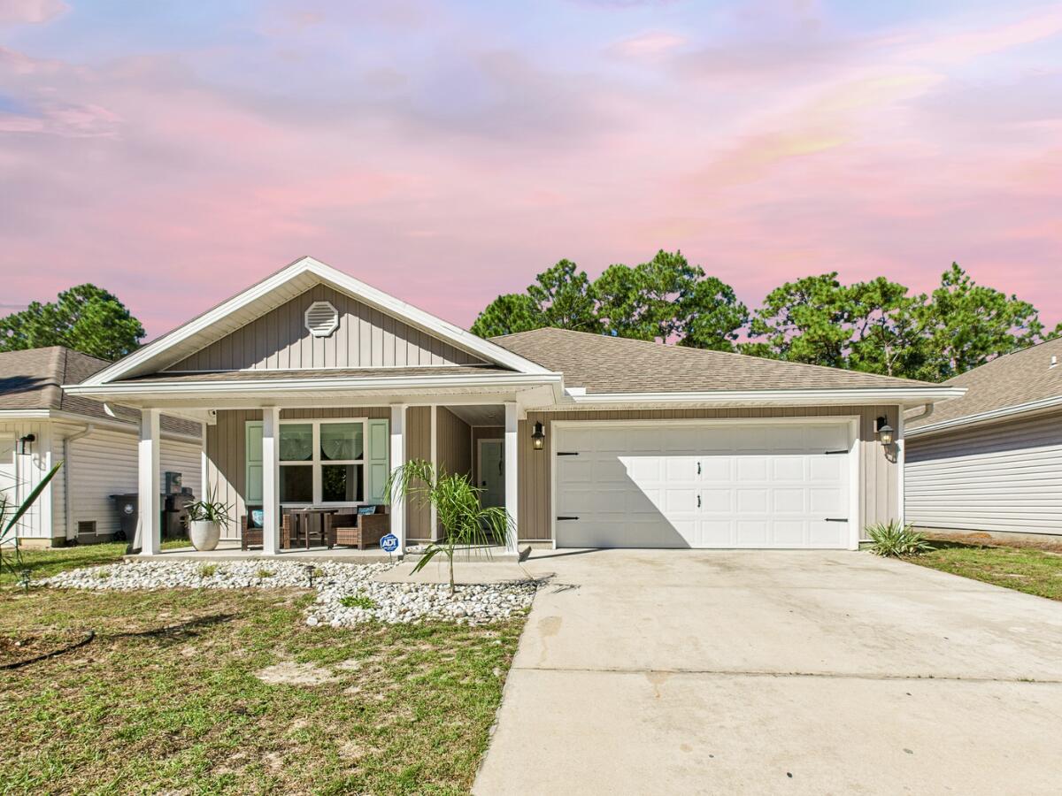 Discover the perfect blend of comfort and coastal charm in this beautifully maintained single-level home, built in 2021 and offering four bedrooms, two full bathrooms, and approximately 2,030 square feet of thoughtfully designed living space. Ideally situated along the highly sought-after 30A corridor, this residence captures the essence of relaxed Florida living with modern finishes and effortless functionality.

An open-concept layout seamlessly connects the kitchen, dining area, and living room—creating an inviting space that's ideal for everyday comfort and entertaining alike. The kitchen features stainless steel appliances and designer touches from the original plan, while the spacious primary suite provides a peaceful retreat. Three additional bedrooms offer flexibility for family, guests, or potential rental use.

The single-story design adds ease of living, complemented by a two-car garage, energy-efficient central HVAC, and the peace of mind that comes with newer construction and minimal maintenance. Situated on a lot of over 6,200 square feet, the home also offers a nicely sized yardperfect for outdoor enjoyment or future enhancements.

Located just minutes from the Gulf beaches, the bay, 30A shopping and dining, and local amenities, this home offers an ideal mix of tranquility and convenience. With its turn-key readiness, modern construction, and prime coastal location, this Santa Rosa Beach gem stands out as an exceptional opportunitywhether you're seeking a primary home, a coastal escape, or a smart investment property.