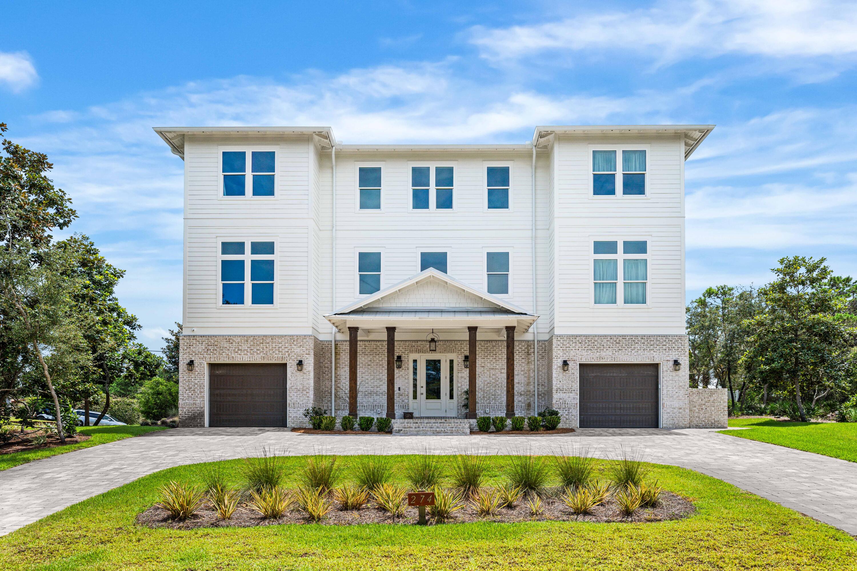Welcome to 274 Overlook Drive in Gulf Pines, a 2025 custom-built home by Castle Construction. Gulf Pines is located on the Gulf of America with over 1300 feet of private deeded beach for owners and their guests. There are 6 oversized bedrooms all with ensuite bathrooms, two are primary bedroom suites. This home has an elevator for ease of access to all 3 floors. The 1st floor has a private bedroom with outdoor patio. Off the main foyer, French doors lead to a built-in summer kitchen with a large outdoor living space, outdoor shower, and half bath. There is room for a future pool and hot tub next to the outdoor living area on the 1st level.  The main living area is on the 2nd floor and has an open concept floor plan with beautiful wood beams with an additional outdoor dining area and outdoor living area, perfect for entertaining family and friends. The kitchen features professional grade stainless steel appliances with custom cabinets and beautiful quartz countertops. Just off the kitchen is a butler's pantry with prep sink and beverage center and custom cabinetry. The 2nd floor also has 2 bedrooms, a laundry room, and a half bath. The 3rd floor features a family room with built-in wet bar and an oversized balcony with panoramic views of the Gulf of Mexico. The 3rd floor has 3 bedrooms; the 2nd primary bedroom suite, as well as guest bedroom 5 and 6. Guest bedroom #6 has custom built bunks to accommodate additional sleeping. There is also a 2nd laundry room on the 3rd floor. Buyer to verify all information deemed important to buyer.