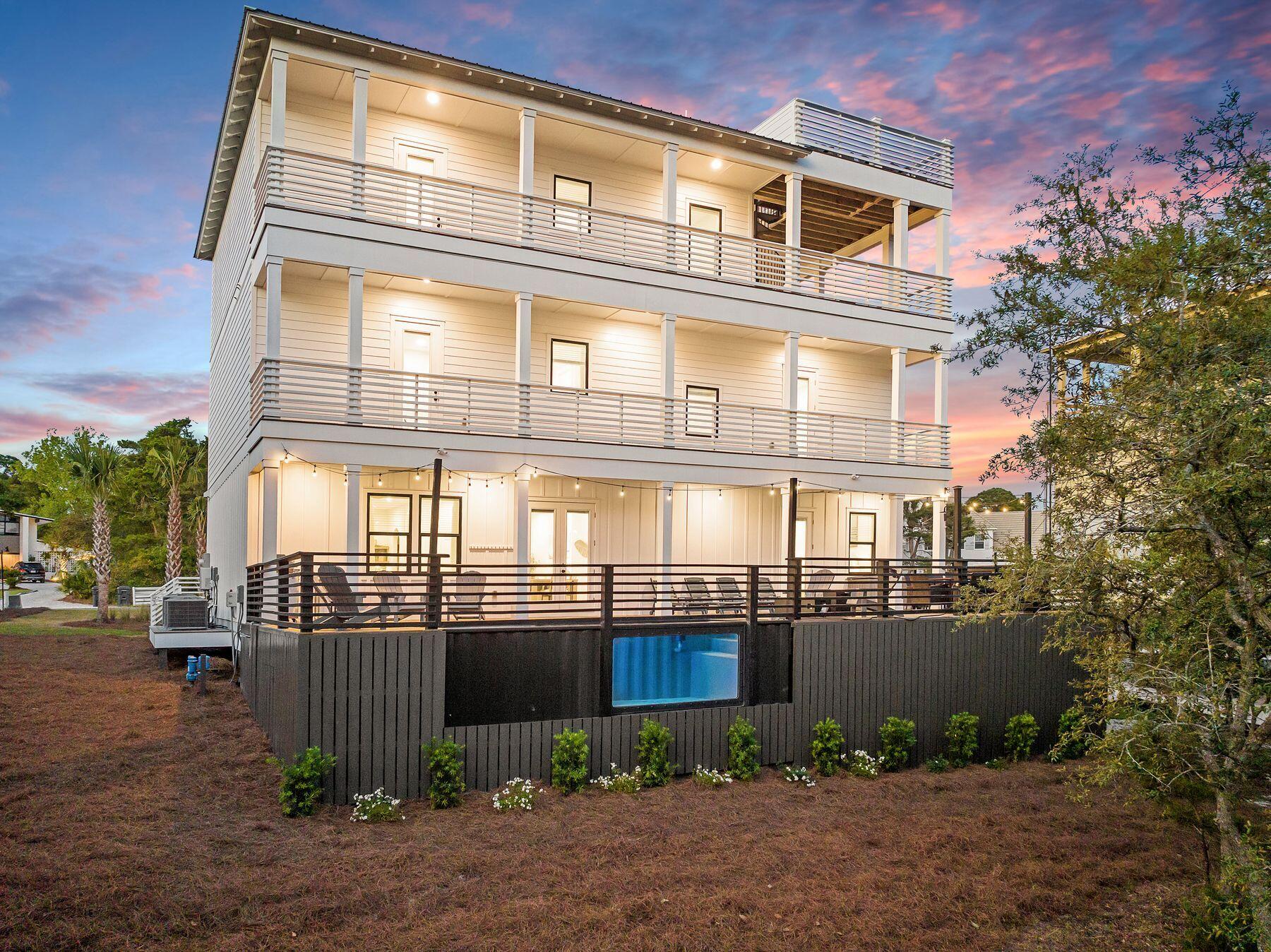 This is a very strong rental home that has $293,748 on the books as of June 29th for the year 2026.  The property generated $244,751 in gross rental revenue in 2025. Also there is 91k already on the books for next year (2027)

Welcome to The Dune Retreat, an 8-bedroom, 8-bathroom coastal home on an elevated lot on Hillcrest Road, offering Gulf views, private resort-style amenities, and a layout well-suited for both personal use and short-term rental income. The home is a short walk to the beach via a pedestrian bridge over Oyster Lake, leading to a low-traffic access point with parking and rinse stations Thoughtfully designed with both full-time living and rental potential in mind, the home features an open-concept floor plan with soaring ceilings, designer lighting, and a chef's kitchen equipped with dual full-size refrigerators, quartz countertops, custom cabinetry, and a custom wood-wrapped vent hood. The spacious dining area comfortably seats ten and is complemented by additional seating at the island, creating an ideal space for entertaining. The living room is warm and inviting, centered around a large sectional and a refined blend of coastal and modern finishes.

Each of the eight bedrooms offers privacy and comfort, with king-sized accommodations and beautifully appointed ensuite bathrooms featuring distinctive tile selections, gold fixtures, and walk-in showers. A thoughtfully designed bunk room includes built-in beds with individual lighting and storage, making it a perfect retreat for younger guests. Two expansive primary suites provide a true escape, complete with soaking tubs, dual vanities, and private balconies overlooking the Gulf and pool. An additional full bath serves the main living level.

Outdoor living is at the heart of the property, with multiple covered balconies designed for relaxation. The private ModPools container pool and spa feature a clear side viewing window and a removable divider for customizable heating. The pool deck offers ample space for lounging and gathering, along with a fire pit, outdoor dining area, built-in gas grill, and outdoor shower.

The rooftop deck serves as the crown jewel of the home, offering panoramic Gulf views and a private setting for sunset gatherings or morning coffee. Entertainment continues indoors with a dedicated game room featuring a full-size pool table, arcade games, and skee-ball, as well as a private theater room with reclining seating, projector screen, and wet bar.

Additional features include smart home capabilities throughout, two full washer and dryer sets, secure owner storage, generous parking for eight or more vehicles, a dedicated golf cart outlet, and a Tesla wall charger. Fully furnished and rental ready, The Dune Retreat delivers a rare combination of elevated design, strong income potential, and the relaxed sophistication that defines 30A living.
