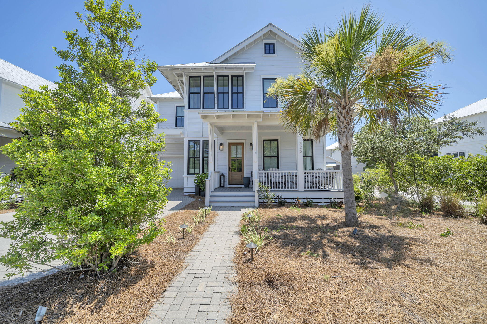 Welcome to 325 Morgan's Trail, a stunning home located in the gated community of The Preserve at Grayton Beach on 30A's west end. Built in 2022, this beautifully designed residence offers a perfect blend of luxury and comfort.
 
This home features 4 spacious bedrooms, each with its own private bathroom, ensuring privacy and convenience for everyone. Additionally, there's a large bunkroom with four custom built-in bunks, perfect for accommodating extra guests or creating a fun space for kids.
 
Step inside to discover a modern open floor plan, complemented by three oversized porches, ideal for relaxing and enjoying the serene surroundings. The home also boasts the convenience of a laundry room on each level and a one-car garage. The large living area includes a cozy fireplace, creating a warm and inviting space for family gatherings. Outdoor living is a delight with a large screened-in porch that includes an outdoor kitchen, perfect for entertaining and enjoying the warm Gulf breezes.  Offered furnished with minor exclusions, this home is move-in ready and awaits your personal touch.  The Preserve at Grayton Beach offers an array of exclusive amenities, including PRIVATE DEEDED BEACH ACCESS via a private boardwalk. Enjoy an active lifestyle with the pickleball court, tennis courts, two community pools, a gym, and walking trails throughout the nature preserve.