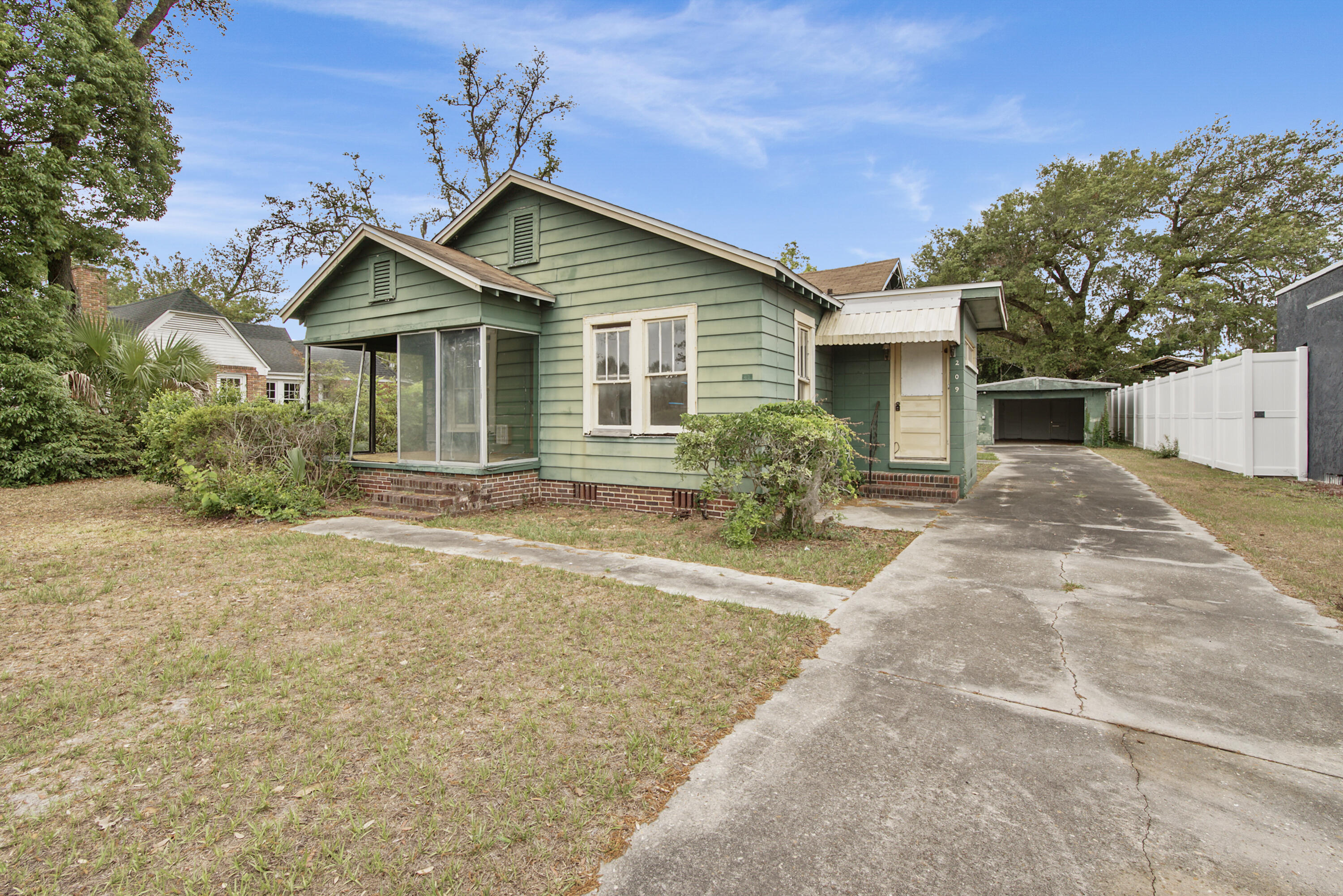 Charming cottage on a large 0.30 acre lot in the heart of The Cove! This 2-bedroom, 2-bath home offers 1,574 sq ft of living space with classic character. Inside, you'll find a spacious layout with defined living areas, abundant natural light, and flexible space for a home office or additional living. The large lot provides plenty of room for outdoor living, expansion, or storage, and the detached 1-car garage adds convenience and value. Located in the highly desirable historic Cove neighborhood, just minutes to downtown Panama City, marinas, and local dining. This home is a great opportunity for a primary residence, second home, or investment property. Call and schedule your showing today.