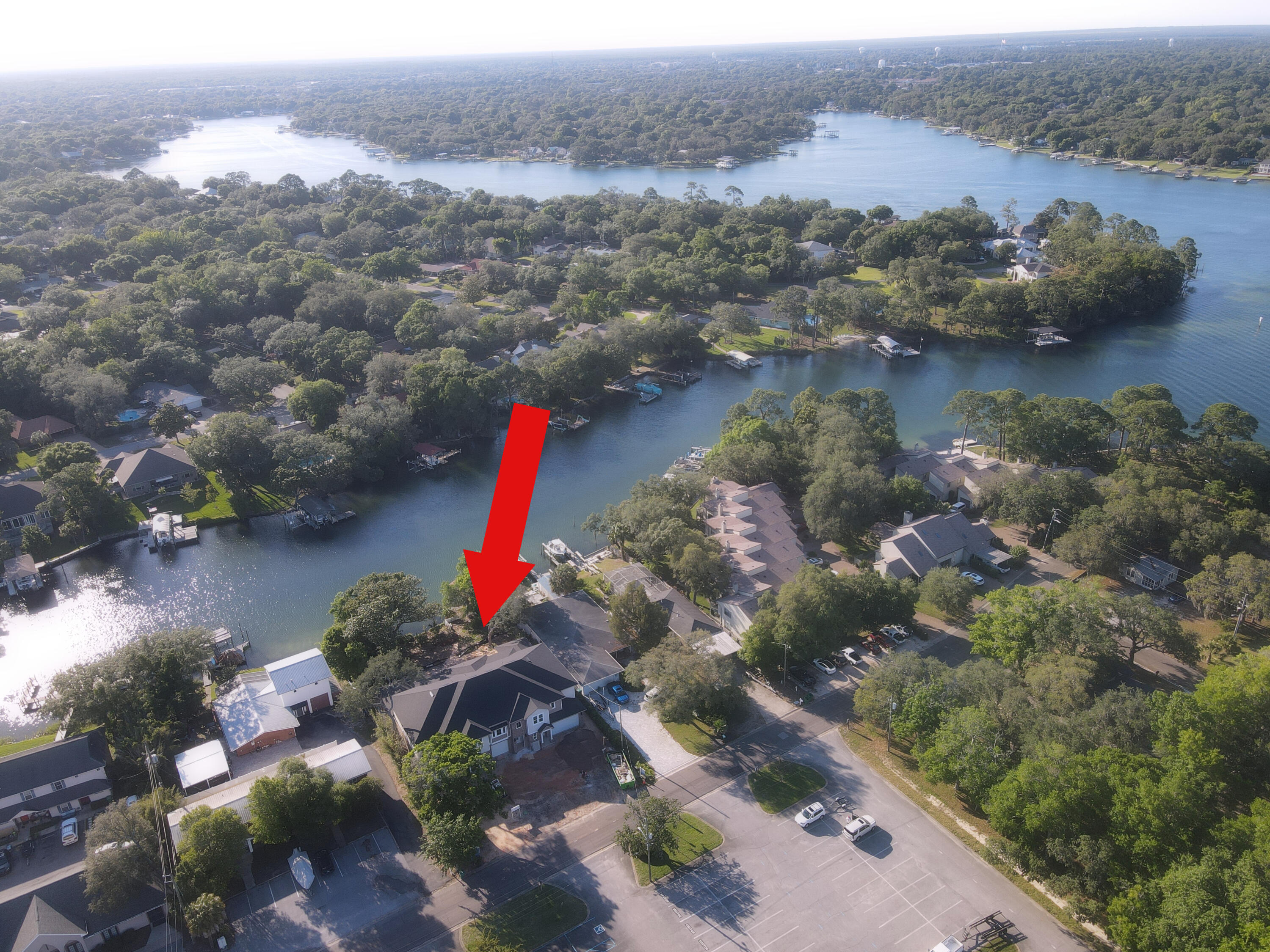 Discover waterfront living in a brand new townhome with a deeded boat slip in the heart of Fort Walton Beach. Designed for modern living, the open-concept main level features a spacious kitchen, living room and master bedroom suite on the first floor. Upstairs, two guest bedrooms are complemented by a versatile loft or flex area and a private balcony overlooking the water. Seller is offering $15,000 'Flex Cash' towards Buyer's closing costs, rate buy down, etc.