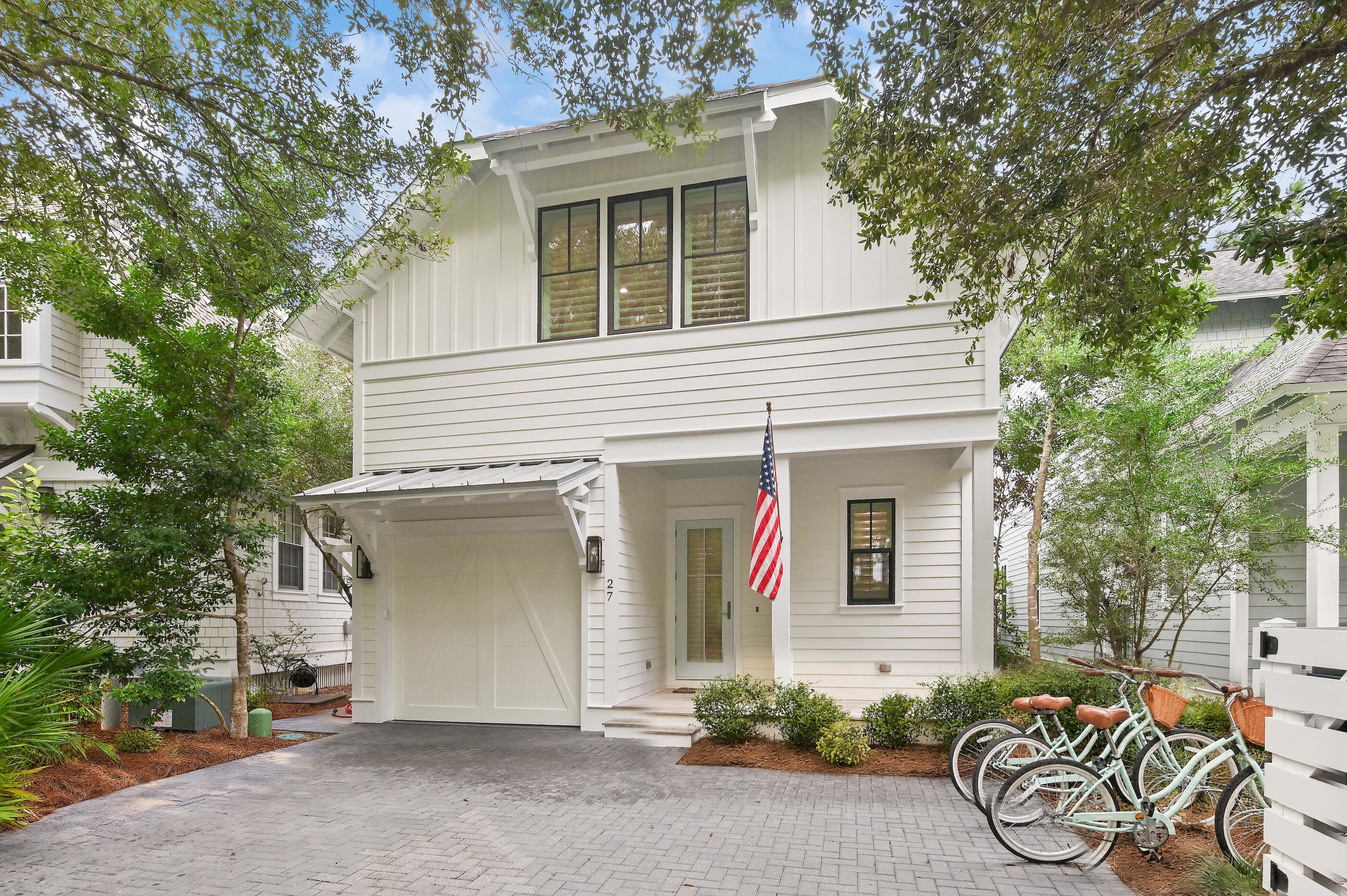 Welcome to 27 Anchor Rode Circle, a beautifully refreshed home overlooking Horseshoe Park in the gated community of WaterSound West Beach. An inviting open floor plan creates an easy flow between the living, dining and kitchen spaces, while the back porch offers a peaceful place to unwind and enjoy afternoons overlooking the park green space. Deeded beach access is provided to the residents of WaterSound West Beach via a private boardwalk that includes bike parking. This charming home is perfect for those desiring a quiet and peaceful setting and offers 3 bedrooms PLUS built-in bunks, 3.5 baths, one car garage, open concept living, screened porch, and second level bonus living space that can be converted to a 4th bedroom. There are two master suites, one on each level, and the upper suite boasts a serene view over the park. Features of this home include hardwood flooring throughout, quartz countertops, wine cooler, custom white cabinetry, shiplap, 10' ceilings, and much more! Enjoy your morning coffee on the screened porch on the park with no rear neighbors. The house has fresh interior and exterior paint, updated lighting/fans, along with all-new furnishings throughout, giving the home an updated, thoughtfully decorated and curated feel from the moment you step inside. The combination of open living spaces, a park-front setting and inviting outdoor areas makes this home equally suited for relaxed days at the beach or gathering with friends and family. Watersound West Beach is 30a's best kept secret for access to the most secluded and beautiful beaches on 30A and features a gated entrance, community pool/clubhouse, putting green, boardwalks for walking/biking, multiple parks, boardwalk to the beach with bike parking, and fitness center at Watersound Beach. The beach access through Deer Lake State Park is a perpetual easement so no customary use worries here! And no crowds! Live the beach life!!!
