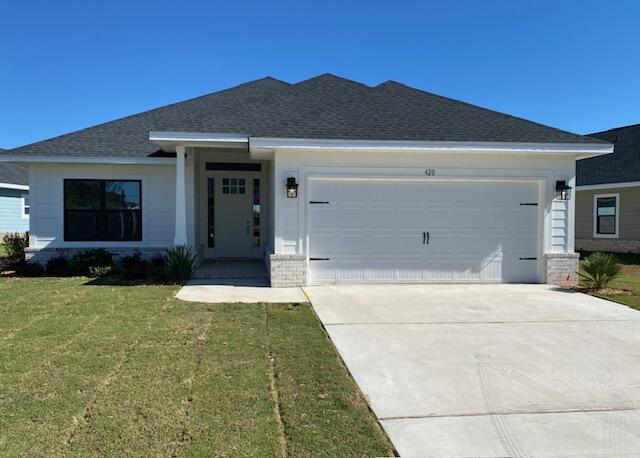 This popular Craftsman-style 4BR/2BA home (currently under construction: (Est. Aug/Sept completion) is ideally located in the back of the community backed up to woods. Designed with both comfort and style in mind, the home features HardieBoard® siding with a brick skirt, vaulted ceilings,  and CoreTec Pro Plus luxury vinyl plank flooring throughout--no carpet. The spacious primary suite boasts elegant tray ceilings, a generous walk-in closet, and a spa-inspired bath. Quartz countertops in the kitchen and baths, soft-close cabinetry, spacious covered patio complete this inviting home, perfect for relaxed everyday living and entertaining. Riverwalk residents enjoy a community pool, clubhouse, fitness center, scenic nature trail, and neighbor hood dock, offering plenty of opportunities to get outside and enjoy the Florida life style.  Adams Homes is offering move in ready package that includes blinds, refrigerator, and washer and dry!  *Pics are of a similar home.*