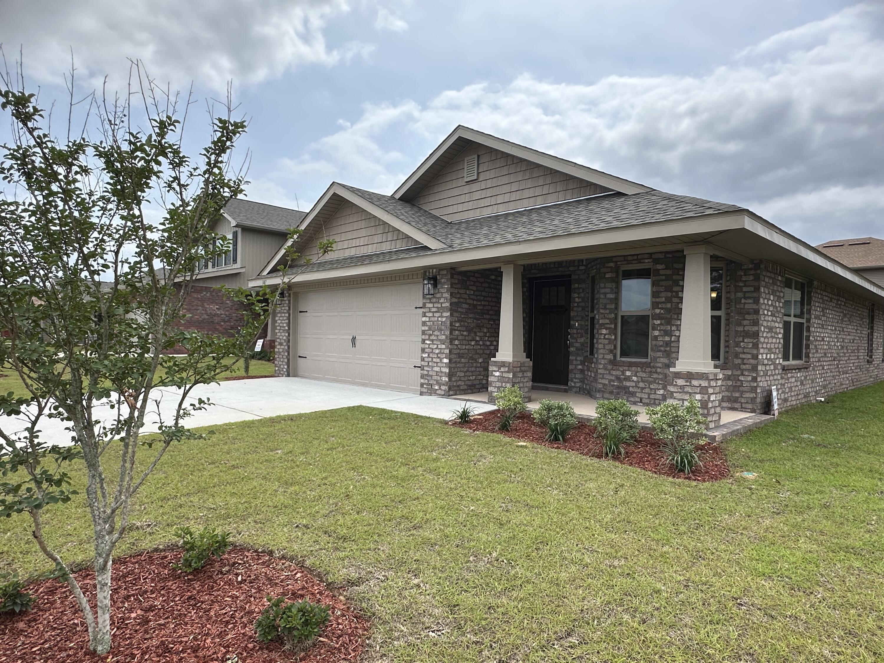 Welcome to this beautiful home that features 3 bedrooms and 2 full bathrooms. It has a formal dining room as you enter that connects conveniently to the kitchen. In the kitchen you will find lovely granite countertops that compliment the all wood soft closed cabinetry. The floors are upgraded with puretech plus LVP and carpet in the bedrooms only. The kitchen oversees the spacious family room that has an entrance to the back covered porch. The master bedroom has a good sized walk in closet. The master bathroom offers dual vanities and a walk in shower. You can enter the laundry room from the 2 car garage which is a finished garage. This home is 4 sided brick and comes with irrigation as well. Schools are A rated and Crestview has ample dining.