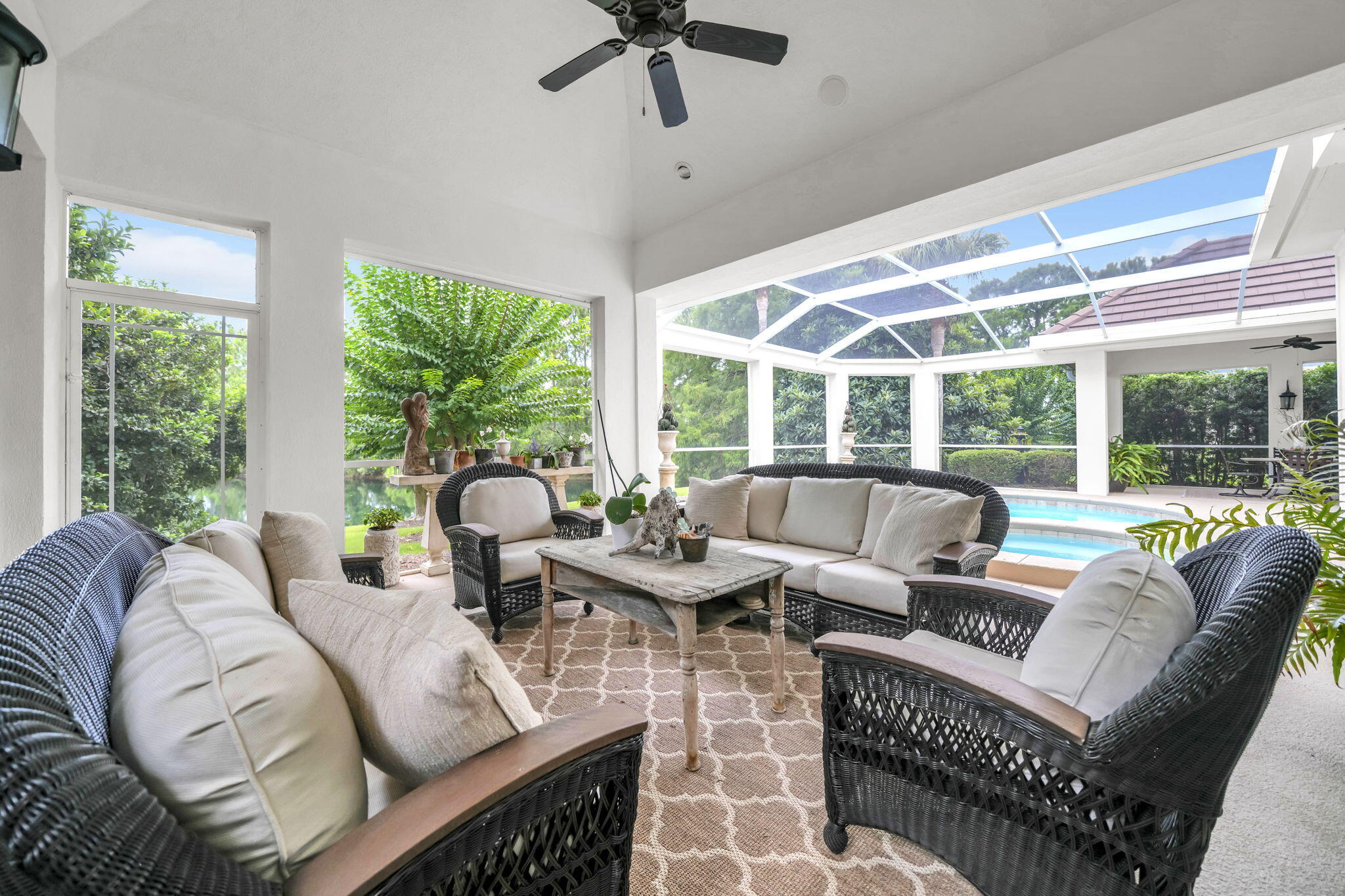 OPEN HOUSE SUNDAY, AUG. 16TH, 1 TO 4 PM! Nestled in desirable Sailmaker Village, where lawn care and landscaping are professionally maintained, this beautifully designed 2,227 square foot patio home offers the perfect blend of elegance, comfort and, carefree living. What really sets this jewel apart is the spectacular 700 sq. ft.  outdoor oasis it offers. The oversized screened lanai features a sparkling pool, relaxing spa, and panoramic views of a tranquil lake and the 5th fairway of Regatta Bay Golf Club--creating a breathtaking backdrop for entertaining, relaxing, or simply enjoying the beauty of each day. The thoughtfully designed split floor plan offers 3 spacious bedrooms, 3 full baths, plus a convenient half bath just off the pool. Included in this sale is the upgraded generator.The private owner's suite is tucked away from the guest bedrooms, providing a peaceful retreat. The open concept living, dining, and kitchen areas are filled with natural light and perfectly positioned to capture the stunning lake views. The spacious kitchen features a handy center island, abundant cabinetry, and an oversized walk-in pantry, making it ideal for living and entertaining. With a highly motivated seller, this exceptional home presents a wonderful opportunity to enjoy the very best of the Florida lifestyle in one of the area's most sought-after communities. From Ketch Court, residents enjoy a secure, beautifully maintained neighborhood and it's just minutes from  the beach!