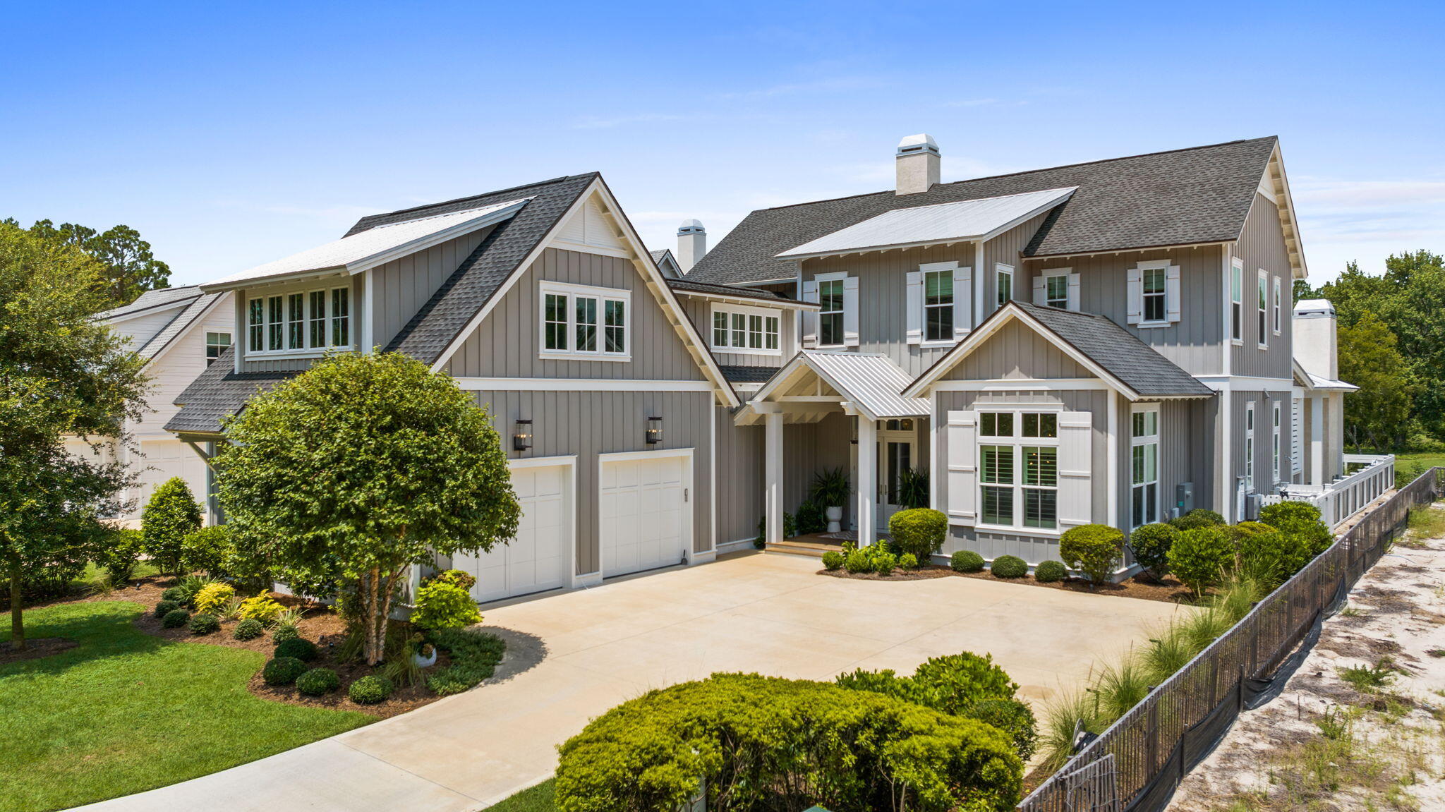 Stunning Romair Construction in the Greenway section of Watersound Origins, offering over 4,600 sq. ft. of inspired living. This beautifully appointed 5-bedroom, 5 full baths and 2 half baths home is located on a cul-de-sac street with sweeping views across three holes of the Watersound Origins Par-3 golf course. Dramatic 12' first-floor ceilings and transom windows flood the interior with light while premium finishes and an open, entertainer-focused layout create effortless flow from room to room. Outside, resort-style amenities include a pool, spa, outdoor summer kitchen and a cabana with a fireplace that perfectly frames the views. A 603-sq. ft. carriage house suite above the two-car garage provides flexible guest living. Homes of this scale and setting are rare!!

Key Features & Upgrades:
- Over 4,600 sq. ft. | 5 BR | 5.5 BA 
- Located on a cul-de-sac street overlooking Watersound Origins Par-3 holes 
- 12' ceilings on first floor with transom windows 
- Resort-style outdoor living: pool, spa, summer kitchen, cabana with fireplace 
- 603-sq. ft. carriage house suite above garage -- ideal guest space 
- Custom built-ins throughout 
- Ubiquiti UniFi professional home network with high-definition security cameras 
- Indoor/outdoor Sonos system with 4 amps, soundbars and subwoofers 
- Extra storage off carriage stairwell in garage 
- 12V outdoor lighting system installed 
- Lutron whole-home networked lighting system Don't miss this rare opportunity to own a show-stopping Romair residence in Watersound Origins -- with unparalleled convenience for quick access to shopping and front-of-community amenities, schedule your private tour today and experience firsthand the scale, finishes, and sweeping golf-course views that set this home apart.