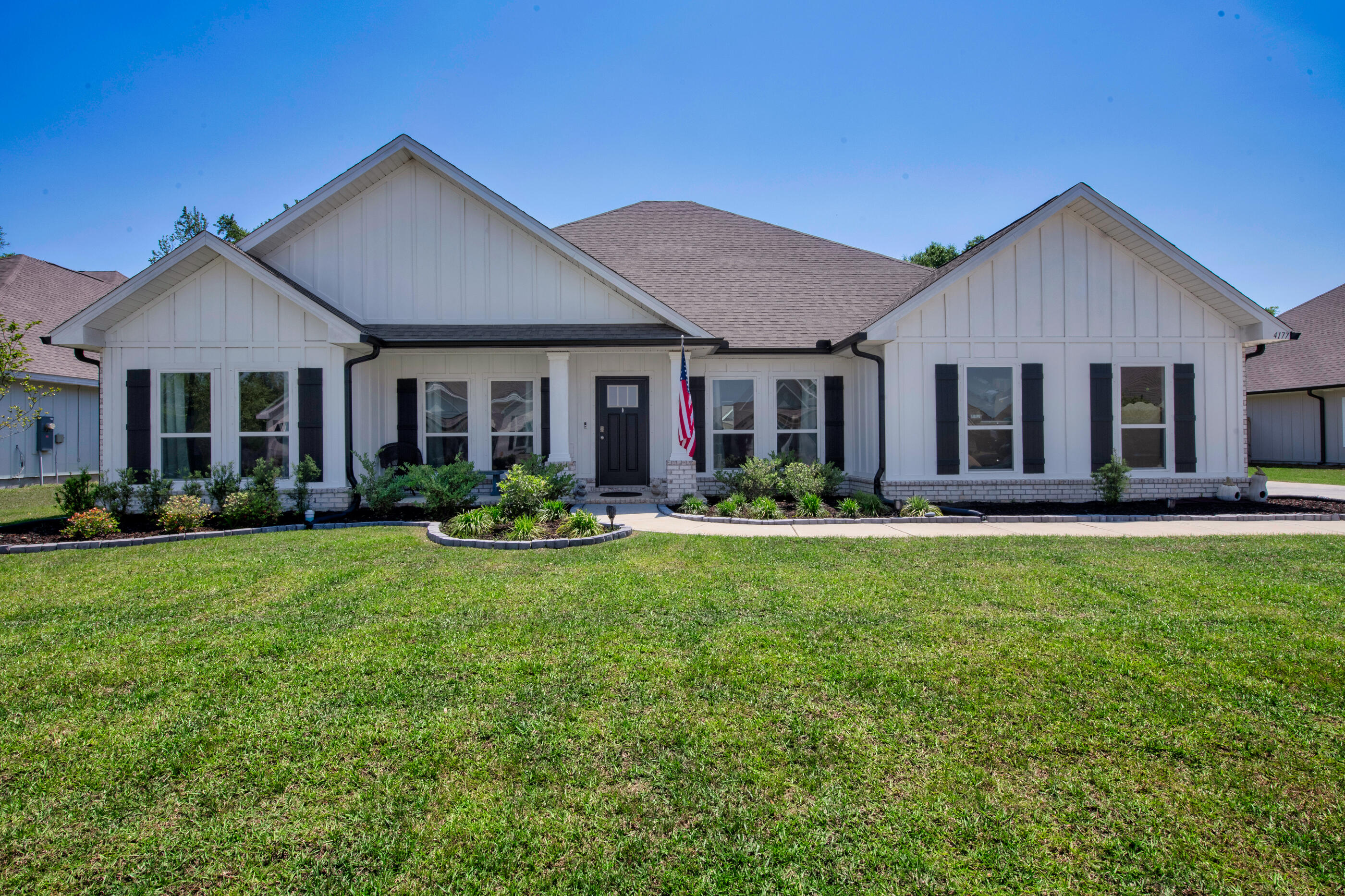 Imagine pulling into your driveway after a long day and immediately feeling the pace of life slow down. The streets are lined with well-kept homes, neighbors are out for an evening walk, and the sense of space is something you notice right away. Welcome to life in Robinson Estates, one of Pace's most desirable communities, where convenience and comfort come together in a way that simply feels right.
Step through the front door and you're greeted by a home that was designed for the way people actually live today. The heart of the home unfolds into an open gathering space where conversations flow easily between the kitchen, dining area, and living room. Whether you're hosting friends for a weekend football game, celebrating holidays with family, or simply enjoying a quiet evening at home, every space feels connected while still offering room to spread out.
The kitchen is where mornings begin with coffee and natural light and where evenings end with everyone gathering around the island sharing stories from the day. Thoughtfully designed finishes, generous workspace, and abundant storage make it as functional as it is beautiful.
Just beyond the main living area, you'll find spaces that adapt to your lifestyle. A dedicated office creates the perfect environment for working remotely, managing a business, studying, or pursuing hobbies without sacrificing the flow of the home. When it's time to relax, the primary suite becomes a true retreat, offering a peaceful escape from the demands of the day.
Outside, the oversized homesite provides something that's becoming increasingly difficult to find: room to breathe. There's space for kids to play, pets to roam, backyard gatherings with friends, or simply enjoying a quiet Florida evening under the stars. The covered outdoor living area extends the home's entertaining possibilities while creating another place to unwind and enjoy the beautiful Gulf Coast climate.
Life in Robinson Estates is about more than just the home itself. Residents enjoy sidewalks, underground utilities, larger homesites, and access to community amenities that encourage connection and an active lifestyle. Families appreciate the proximity to highly regarded Pace schools, while commuters enjoy convenient access to Milton, Pensacola, medical facilities, shopping, dining, and everyday necessities.
For buyers seeking a newer home, a welcoming community, and a lifestyle that balances space, convenience, and connection, this property offers an opportunity to put down roots in one of Santa Rosa County's most sought-after areas.
This is the kind of place where memories are made, milestones are celebrated, and every day feels just a little easier. Welcome home.