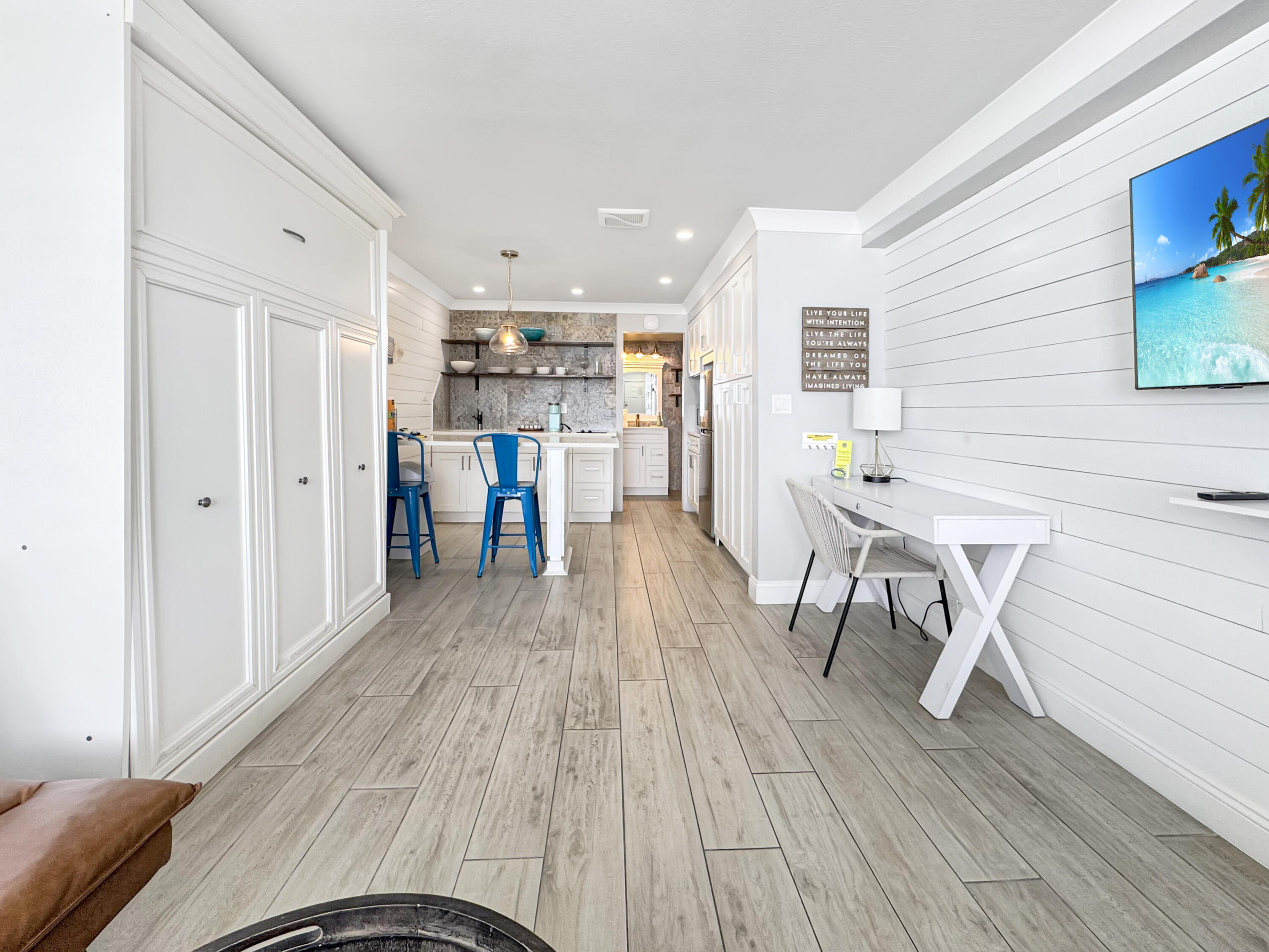 Investor alert! This is hands-down one of the best opportunities in Fontainebleau with proven rental performance and stunning Gulf-front views. This beautifully renovated beachfront studio generated an impressive $27,303 in 2024 and has already produced $22,376 in 2025, making it an exceptional turnkey investment on the Gulf Coast. Located directly on the sugar-white sands of Panama City Beach, this iconic 2nd floor condo offers unobstructed east facing views of the Gulf and true beachfront living just steps from the water. Thoughtfully updated with coastal-inspired finishes, the unit features shiplap walls, quartz countertops, a full kitchen with full-size refrigerator, cooktop, and microwave, plus a Murphy bed that maximizes both functionality and space. Fontainebleau offers outstanding resort-style amenities including a large Gulf-front pool, expansive sun decks, fitness center, beach volleyball courts, wireless internet, elevator access, and on-site management. One assigned parking space is included. The HOA dues provide exceptional value by covering all utilities(even electricity), internet, building insurance including flood and hurricane coverage, exterior maintenance, amenities, and management services for truly low-maintenance ownership. Ideally situated on a less crowded stretch of beach overlooking Bid-A-Wee beach access with no future development blocking the views, yet conveniently located near Pier Park, Top Golf, shopping, dining, and entertainment.  Whether you're looking for a vacation getaway or a high-performing short-term rental investment, this fully updated Gulf-front studio is an opportunity you do not want to miss.