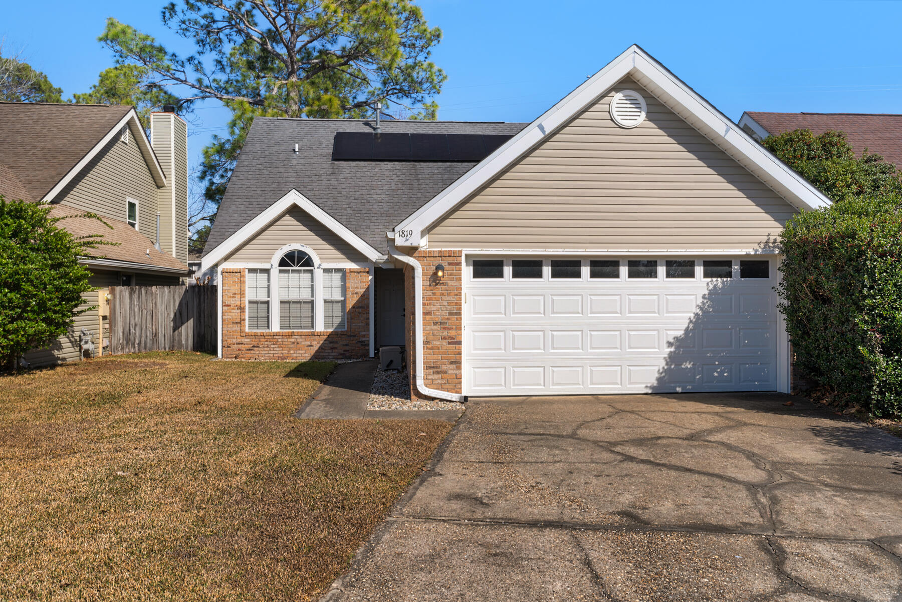 Welcome home to this charming 3-bedroom retreat, perfectly situated between Eglin AFB and Hurlburt Field, making your commute a breeze! Step inside to a bright and inviting living room featuring soaring cathedral ceilings, a cozy wood-burning fireplace, and an open layout that's perfect for relaxing or entertaining. The desirable split-bedroom floor plan provides added privacy, with the spacious primary suite tucked away from the secondary bedrooms. The primary bedroom offers a private en-suite bath complete with a double vanity, walk-in closet, and plenty of space to unwind. Outside, enjoy a fully fenced backyard with a private patio, ideal for grilling, entertaining, or simply enjoying the Florida sunshine. Pets are welcome! The owner will allow cats and dogs up to 50 lbs. with an approved pet application for each pet. A $350 non-refundable pet fee per pet applies. Don't miss your opportunity to call this conveniently located, pet-friendly home your own, schedule your showing today! All Coastal Realty Services residents are enrolled in the Resident Benefits Package (RBP) which includes renters insurance, HVAC air filter delivery (for applicable properties) and our best-in-class resident rewards program, and much more! More details upon application.