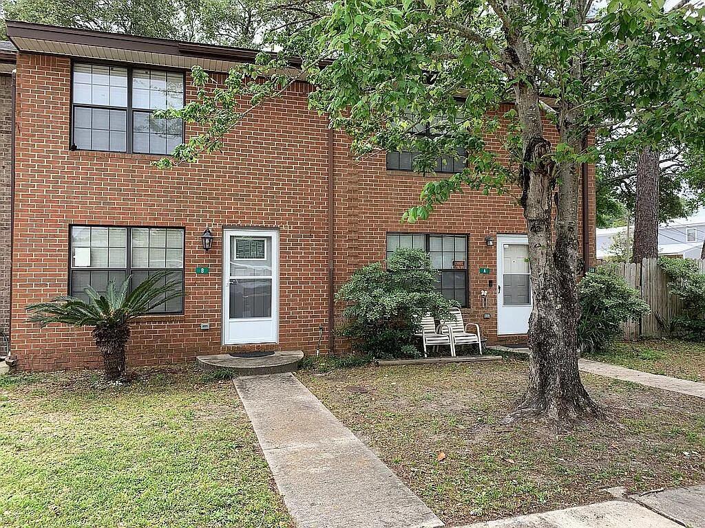 Updated townhome located in the growing downtown Fort Walton Beach area. Features include cork flooring, hurricane-rated windows, covered patio, privacy fenced backyard with artificial turf, and two parking spaces. Living area, utility room, and half bath located downstairs with both bedrooms upstairs. Kitchen appliances included. Conveniently located near shopping, dining, entertainment, beaches, and military bases. No HOA. Dishwasher provided AS-IS. Tenant to verify all information deemed important.
