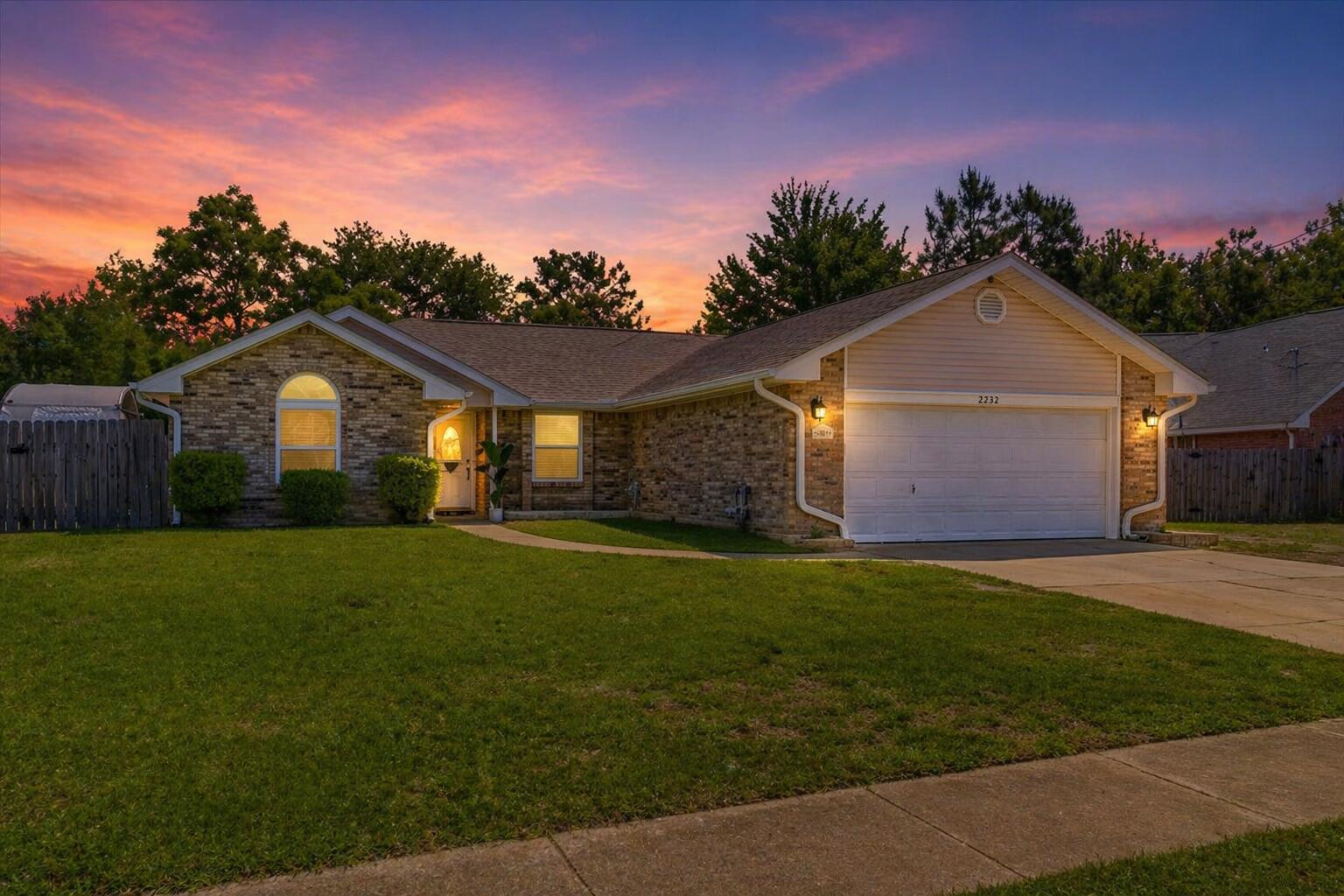 This move-in ready gem in East Navarre is loaded with a top to bottom refresh. Plus, the big-ticket items are already handled: Roof 2022, HVAC 2023, Water Heater 2020. 

Vaulted ceilings, fresh paint, inside and out, smooth ceilings throughout (no popcorn in sight), updated lighting, new ceiling fans, brushed nickel finishes on every fixture and piece of hardware creates a cohesive, polished look. The kitchen shines with new quartz countertops and new stainless steel sink. And lets not forget the new paddle switches and outlets for a finishing touch.

Five new vinyl windows improves curb appeal, efficiency and sound deadening. The Florida room, covered patio, the freshly pressure washed exterior, and a gravel RV / boat pad with 30-amp hookup out back is perfect for year round enjoyment! This location couldn't be more dialed in. Nestled near a quiet cul-de-sac in East Navarre, you're minutes from Walmart, the sugar-white beaches of the Emerald Coast, Hurlburt Field, and NAS Whiting Field -- less time commuting, more time living.

PCS season is here, and this home is ready for you. Whether you're a veteran looking to assume that unbeatable rate or a buyer tired of renting -- 2232 Lemure Drive is an affordable option in a fantastic location.

VA assumable loan at 4.75% interest, with just an $80,000 balance and 15 years left on the term, a qualified buyer with VA loan entitlement can step into instant equity and a $1,313 monthly payment that today's market simply can't touch.

All information is deemed to be reliable and parcel records are pulled from county property tax records; however, buyer and buyer's agent are responsible for their own due diligence and verification of any information.