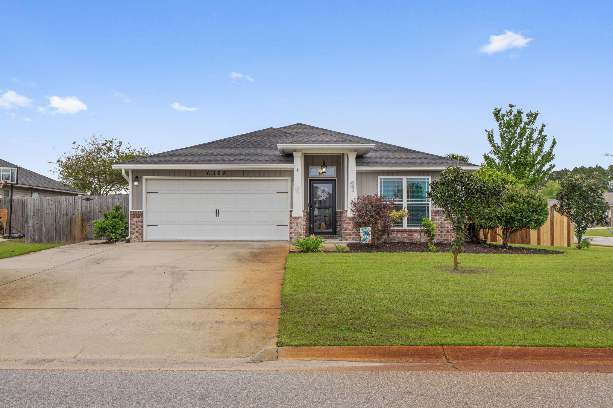 Welcome to this charming 3-bedroom, 2-bath home on a desirable corner lot, blending modern style with practical amenities. Inside, you will find nicely done accents, such as backsplash in the kitchen, and a bright, comfortable open concept layout ideal for families. The property features beautiful landscaping with a large back patio for entertaining, an automated irrigation system, fenced yard and a handy shed for storage. Conveniently located close to schools and just minutes from the beach, this property has everything you need!