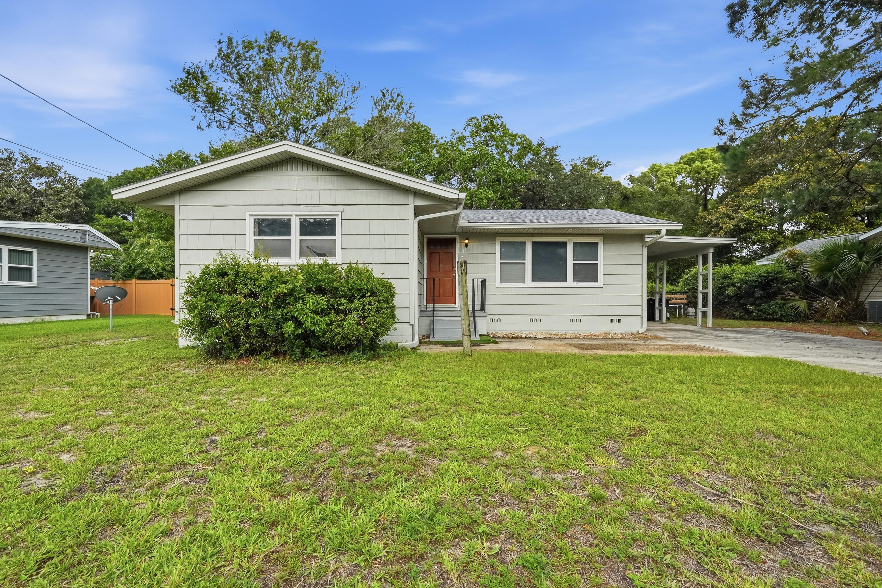 The opportunities are truly endless with this unique multi generational property in the heart of Fort Walton Beach. Whether you're looking for a primary residence with space for extended family, a house hack by living in one side while renting the other, or a full investment property, this home offers incredible flexibility. The previous owner successfully rented both living spaces, making this an excellent income producing opportunity.

Situated on a spacious quarter acre level lot, this versatile property features two completely functional living areas under one roof, each with its own kitchen, living room, bedroom accommodations, bathroom, and private entrance, allowing for both privacy and convenience.

The main living area offers a spacious living room, dining area, kitchen with pantry, three bedrooms, including a primary bedroom with dual closets, and a full bathroom. The third bedroom also provides interior access to the second living area, giving you the option to keep the spaces connected or utilize them independently.

The second living space is perfect for aging parents, adult children, guests, long term tenants, or additional rental income. It features its own private entrance, full kitchen, living room, bedroom, and full bathroom, creating a comfortable and self sufficient living arrangement.

Outside, you'll find a covered carport, oversized driveway with abundant parking, a utility room, storage building, and a large backyard with plenty of room to enjoy. Additional features include a dimensional shingle roof with gutters and a lawn pump for irrigation.

Properties with this level of versatility are hard to find. Live in one side and let rental income help offset your mortgage, lease both units for maximum investment potential, or create the perfect setup for multi generational living. Whether you're an investor or a homeowner looking for flexibility, this property is full of possibilities.