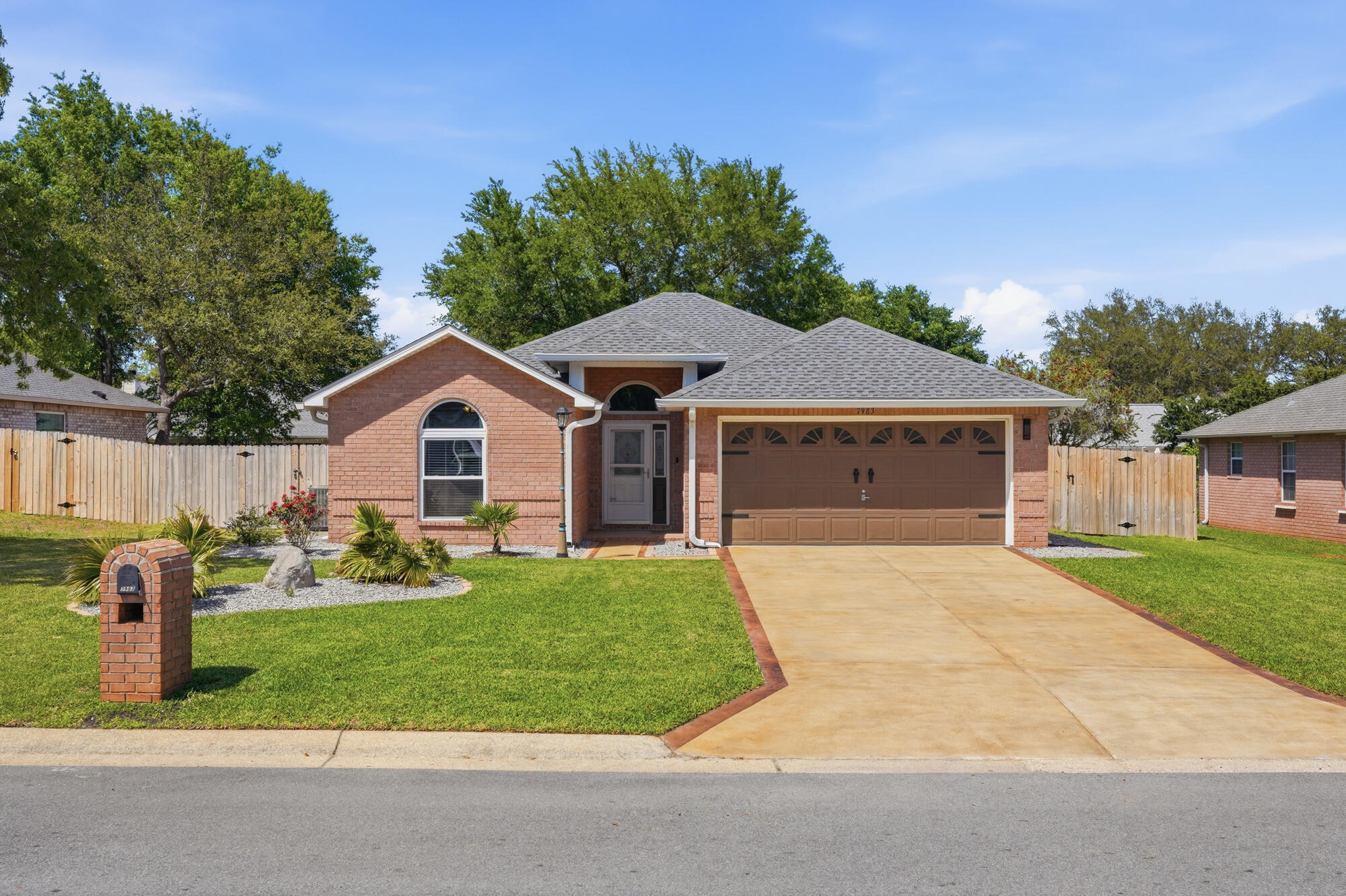 Welcome to this beautifully maintained 3BR/2BA Navarre home! Featuring fresh interior paint and a relaxing screened porch perfect for Florida living. The spacious master bathroom has 2 separate walk-in closets, and all major updates are already done - water heater 2019, roof, HVAC, and hurricane impact windows in 2022, giving peace of mind and modern comfort. Reasonable HOA fee of $400/yr. Move-in ready and full of charm, this home is ready for its next chapter!