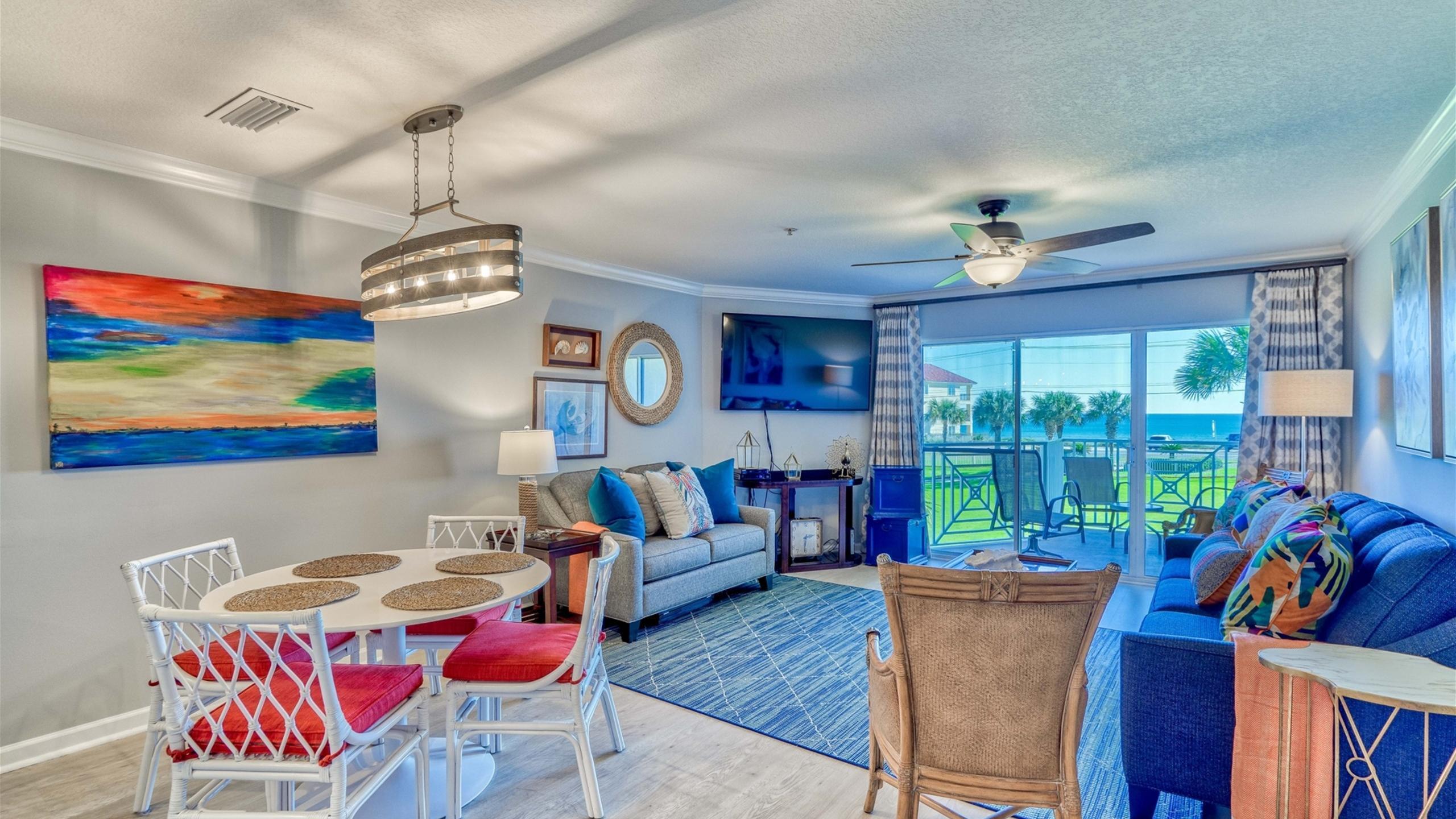 Experience the best of Gulf-front living in this beautifully appointed condo offering stunning Gulf views from the closest Amalfi building to the Gulf. Thoughtfully designed with $8,000 of custom window treatments, this residence showcases a refined coastal aesthetic with beautiful furnishings, upscale finishes, and exceptionally nice bedding throughout.

Amalfi Coast Resort is a gated community set on 8.5 acres of lushly landscaped grounds, offering an impressive array of amenities including a serene koi pond, fitness center, community fire pit, two swimming pools with one heated seasonally, tennis courts, and a clubhouse facility. One assigned parking space with a storage cage in garage. The beautifully maintained grounds create a peaceful resort-like setting while keeping you just steps from the beach and all that the Emerald Coast has to offer.

Inside Unit A206, enjoy a bright and inviting living space designed for both relaxation and entertaining. The A Building location provides a wonderful vantage point with beautiful views of the Gulf, allowing you to enjoy the scenery from the comfort of your own retreat.

Whether you're looking for a beach getaway, second home, or investment property, this condo offers a combination of designer touches, quality furnishings, resort amenities, and spectacular Gulf views. With its prime location being within walking distance of popular beachside dining, making it easy to grab a casual lunch, enjoy a sunset dinner, or head out for drinks without ever having to get in the car