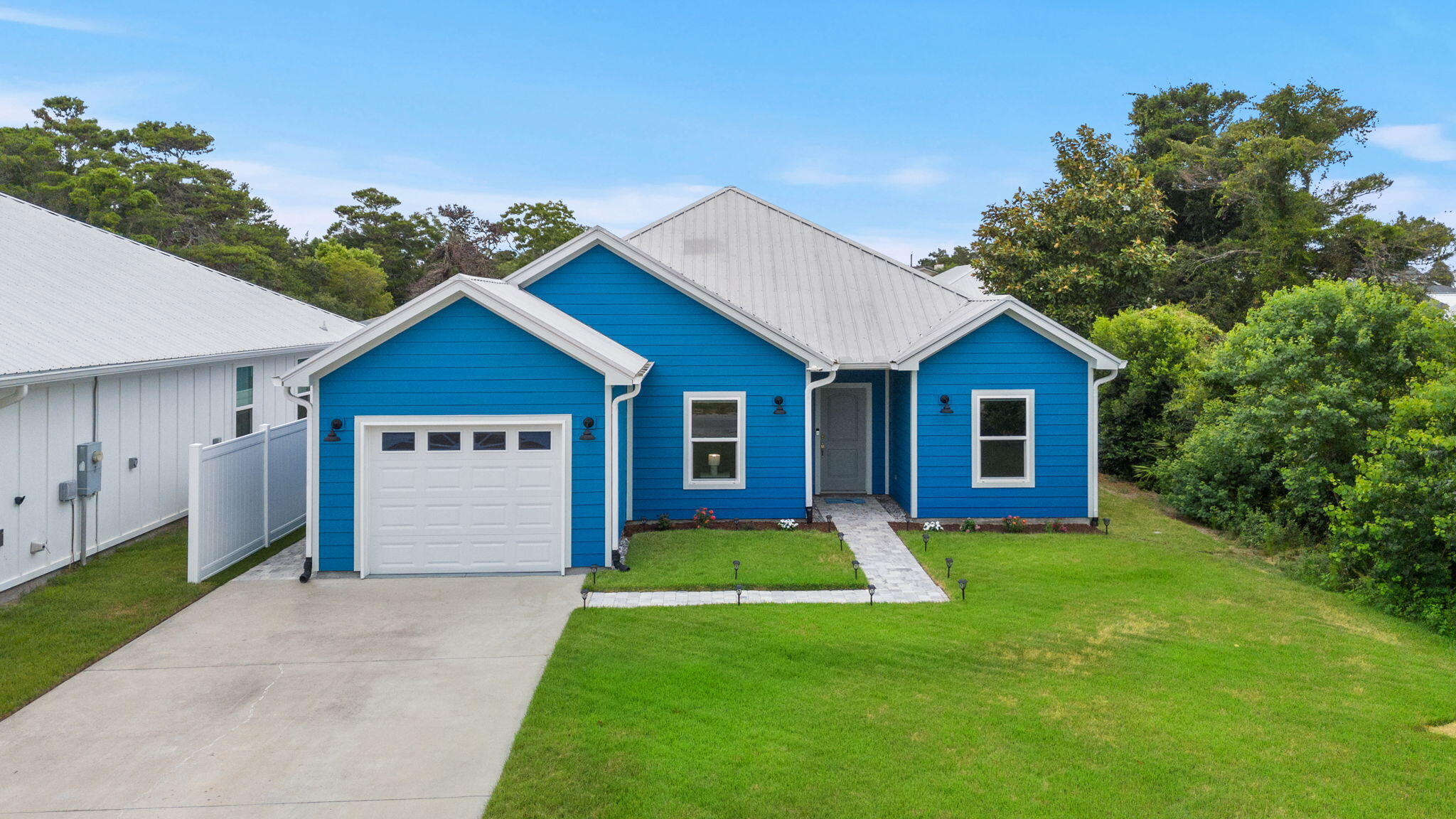 Cute and coastal! Built in 2018 and lovingly maintained by its original owner as a primary residence, this beautifully kept 2-bedroom, 2-bathroom home with a bonus room offers the perfect blend of comfort, convenience, and beachside living.

Designed for easy, low-maintenance living, the home features a functional layout, spacious indoor and outdoor living areas, and thoughtful updates throughout. Step outside to your private backyard oasis, complete with a pool and a large covered patio that's perfect for entertaining, relaxing, and enjoying fun in the sun year-round.

Situated on a quiet street just blocks from the sugar-white sands of Panama City Beach, this property offers the ideal balance of privacy and accessibility. Ample parking provides plenty of room for vehicles, boats, golf carts, or visiting guests.

Whether you're looking for a full-time residence, second home, or investment opportunity, 234 Attu Street delivers modern construction, coastal charm, and an unbeatable location near the Gulf's sugar-white sands, local dining, shopping, and entertainment. Enjoy poolside fun in the sun, morning walks to the beach, and all the benefits of a newer home in one of Panama City Beach's most desirable areas.