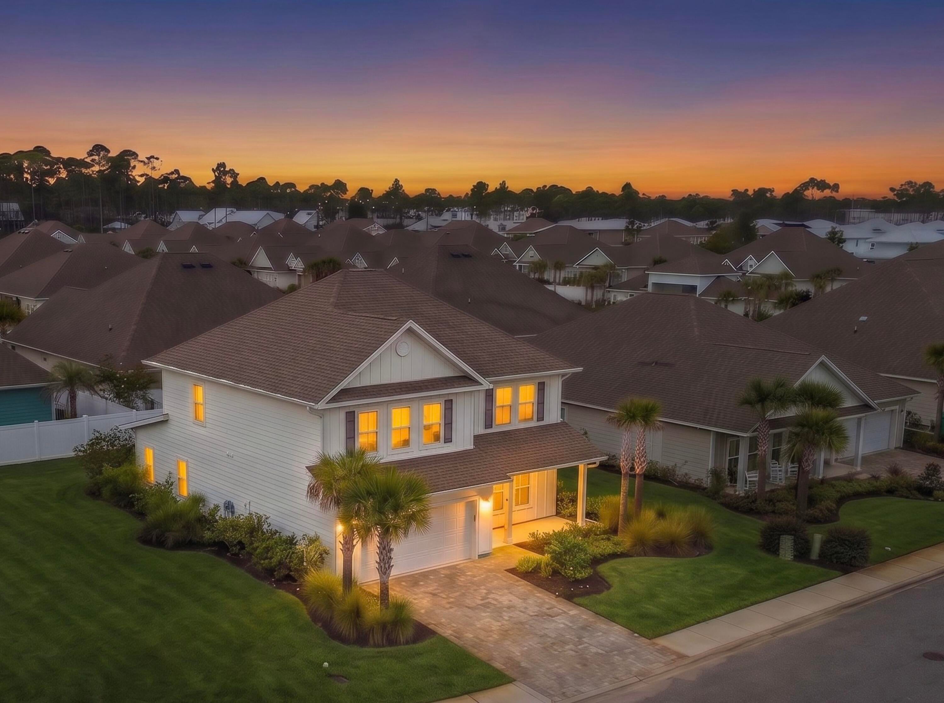 Positioned south of Highway 98 in the gated enclave of Lakeview Estates, this 4-bedroom, 3.5-bath residence enjoys one of South Walton's most desirable locations -- close enough to hop on a golf cart or bike for an easy ride to the sugar-white sands of 30A. The community's gated entry offers a quiet reprieve from through traffic, while a scenic path connects residents directly to Helen McCall Park, and a generously sized community pool serves as a favorite gathering spot for neighbors to unwind and connect.

Set on a spacious corner lot, the home itself offers an open-concept floor plan where living and dining areas flow effortlessly into a well-appointed kitchen -- a layout made for both quiet evenings and easy entertaining. Abundant natural light fills the home through large windows throughout. The first floor is thoughtfully designed with a private master suite, a powder bath for guests, and access to the two-car garage. Upstairs, a versatile loft awaits its next chapter -- envision a second family room, game room, media space, home office, or children's play area. Two additional bedrooms share a convenient Jack-and-Jill bath, while a fourth bedroom enjoys its own dedicated bath. A second-floor laundry room adds everyday ease within easy reach of every bedroom.

Beyond its gates, Lakeview Estates places residents within easy reach of Scenic Highway 30A's white-sand beaches, boutique shopping, celebrated dining, and endless outdoor recreation. Whether embraced as a primary residence or a coastal second home, this property offers a rare combination of space, thoughtful design, and an ideal South Walton location.