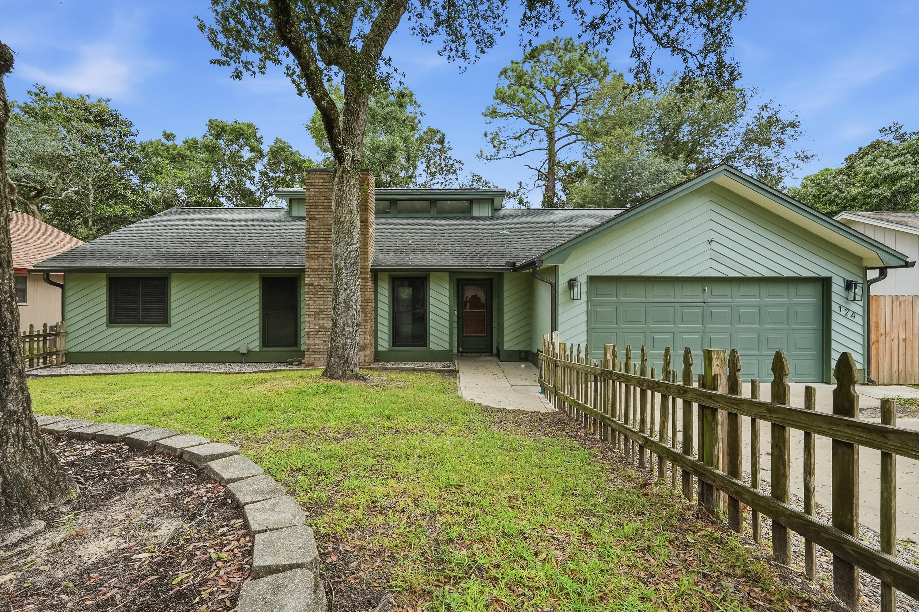 Welcome home to this beautifully located 3-bedroom, 2-bathroom home offering easy access to shopping, military bases, and the beautiful Gulf Coast beaches. The spacious family room makes a statement with impressive 15-foot vaulted ceilings, creating an open and airy atmosphere.

The well-designed kitchen features granite countertops, stainless steel appliances, and plenty of counter space for cooking and entertaining. The desirable split floor plan provides privacy, with the spacious primary suite located separately from the additional bedrooms. The primary suite includes a walk-in closet, while two additional bedrooms and a full bathroom are situated on the opposite side of the home.

Step outside to enjoy the newly built backyard deck overlooking a fully fenced, secluded backyard. The private outdoor space is perfect for relaxing, entertaining, or gathering around the backyard fire pit. Additional features include durable LVP flooring throughout and a tankless water heater for added efficiency and convenience. With its fantastic location, spacious layout, and private outdoor living area, this home is a must-see! Pets considered with application. Contact us today for a showing!