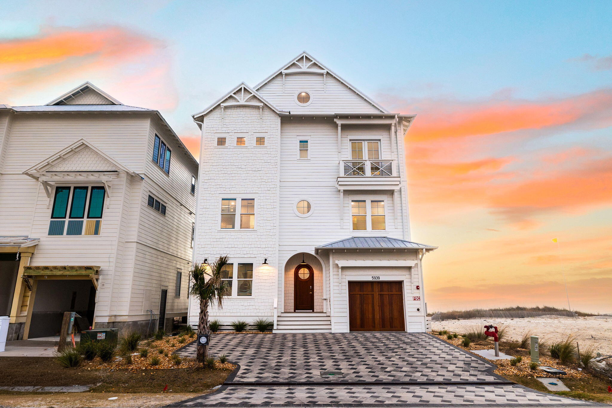 Experience the pinnacle of Gulf-front luxury at 5939 Gulf Drive, a newly constructed coastal estate located within the exclusive beachfront enclave of Hadley's Beach in Panama City Beach. Perfectly positioned directly on the sugar-white sands with 50 feet of Gulf frontage, this extraordinary four-story residence offers nearly 6,000 square feet of thoughtfully designed living space with 8 bedrooms, 10 full baths, 1 half bath, a bunk room, recreation room, private elevator, and a stunning private Gulf-front pool.

Designed to balance sophistication, comfort, and investment potential, this fully furnished home is already operating as a short-term rental opportunity. Expansive gathering spaces, multiple Gulf-front balconies, and panoramic emerald-water views create an unforgettable coastal experience for owners and guests alike. The open-concept main living area showcases elevated finishes, generous entertaining spaces, and seamless indoor-outdoor flow overlooking the beach.

Whether you are seeking a luxury second home, an elite investment property, or a legacy beachfront estate, 5939 Gulf Drive delivers an exceptional opportunity to own one of Panama City Beach's newest premier Gulf-front residences.