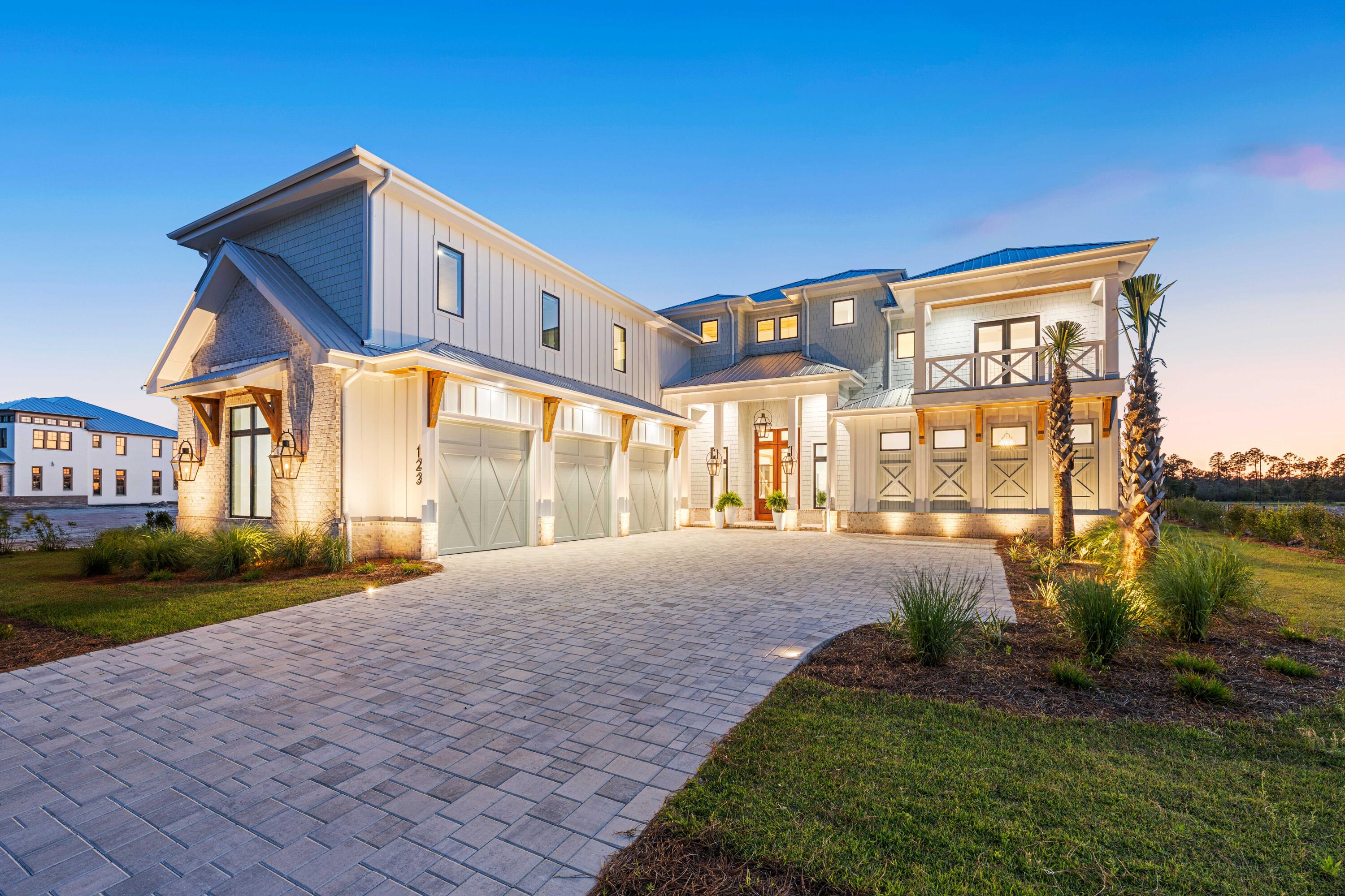On 30A, where luxury is the standard, true value is rare. 123 N. Southern Cross Lane stands apart - not simply as another architecturally distinguished residence, but as one of the most compelling value propositions per square foot in Watersound Camp Creek today. At 6,651 square feet of bespoke coastal living, priced at $5,995,000, this newly completed waterfront retreat delivers a level of finish, scale, and lifestyle access that routinely commands significantly more. For buyers who understand value, the math is unambiguous.

Step through custom double Honduran mahogany doors into a world of considered luxury..... The grand room rises beneath 27-foot vaulted ceilings -- a dramatic, light-filled space anchored by walls of glass that dissolve the boundary between indoors and the tranquil waterway beyond. White oak trim, pecky cypress accents, and antique European doors woven throughout the home give it the rare quality that sets great architecture apart from mere construction: character.

The designer kitchen is built for both the serious chef and the effortless entertainer -- Wolf appliances, a three-inch quartz waterfall island, a hidden pantry, and a dedicated wine storage room ensure no detail has been overlooked. Beyond the kitchen, the home unfolds into a series of private sanctuaries: a dedicated infrared sauna, a private cinema room, a custom-designed bunk suite, and an expansive upstairs family lounge that gives the home its rare ability to serve both the intimate gathering and the multi-generational retreat with equal grace.

The office -- framed by a striking antique Egyptian door -- is the kind of workspace that inspires rather than merely functions. Even the garage has been finished with precision: a sleek epoxy floor that speaks to the home's refusal to leave any corner unconsidered.

Lots like this are not built -- they are found. Backing directly onto the water, this property delivers the natural backdrop that transforms a great home into an irreplaceable one. Step outside to a private saltwater pool and spa, a full outdoor kitchen, and a fireplace positioned to catch the coastal breeze and the shimmer of the water at golden hour. It is the kind of outdoor living that turns an evening at home into something you would pay to experience elsewhere.

Ownership at 123 N. Southern Cross Lane comes with the opportunity to apply for membership at Watersound Club -- one of the most comprehensive private club experiences anywhere on the Gulf Coast. This is not a clubhouse with a pool. This is a resort, privately yours.

Members enjoy private beach access with full towel and chair service, multiple resort-style pools, a lazy river, and a dedicated lap pool -- all part of the Camp Creek amenity campus. Golf is at the center of the lifestyle here: unlimited rounds across three premier courses -- Camp Creek, Shark's Tooth, and The Third -- with no green fees, no cart fees, and access to top-tier practice facilities that would satisfy even the most serious player.

The Wellness Center is state-of-the-art. Eight Har-Tru tennis courts and eight dedicated pickleball courts serve those who want their fitness served with friendly competition. For the moments in between, VIP dining and spa privileges at The Pearl Hotel, WaterColor Inn, and Camp Creek Inn ensure that every aspect of life along 30A is elevated -- not just the days you spend at home.

Watersound Camp Creek is a community of just 263 homesites. Homes of this scale, on waterfront lots, newly completed with this level of finish, simply do not come to market often. When they do, they move -- and they rarely offer this kind of value.

123 N. Southern Cross Lane is not just a home. It is a chance to live inside one of 30A's most thoughtfully crafted communities at a moment when the opportunity still exists. The architecture is extraordinary. The setting is irreplaceable. The value, at this price per square foot, is the story.

Furnishings are negotiable. The lifestyle is not.