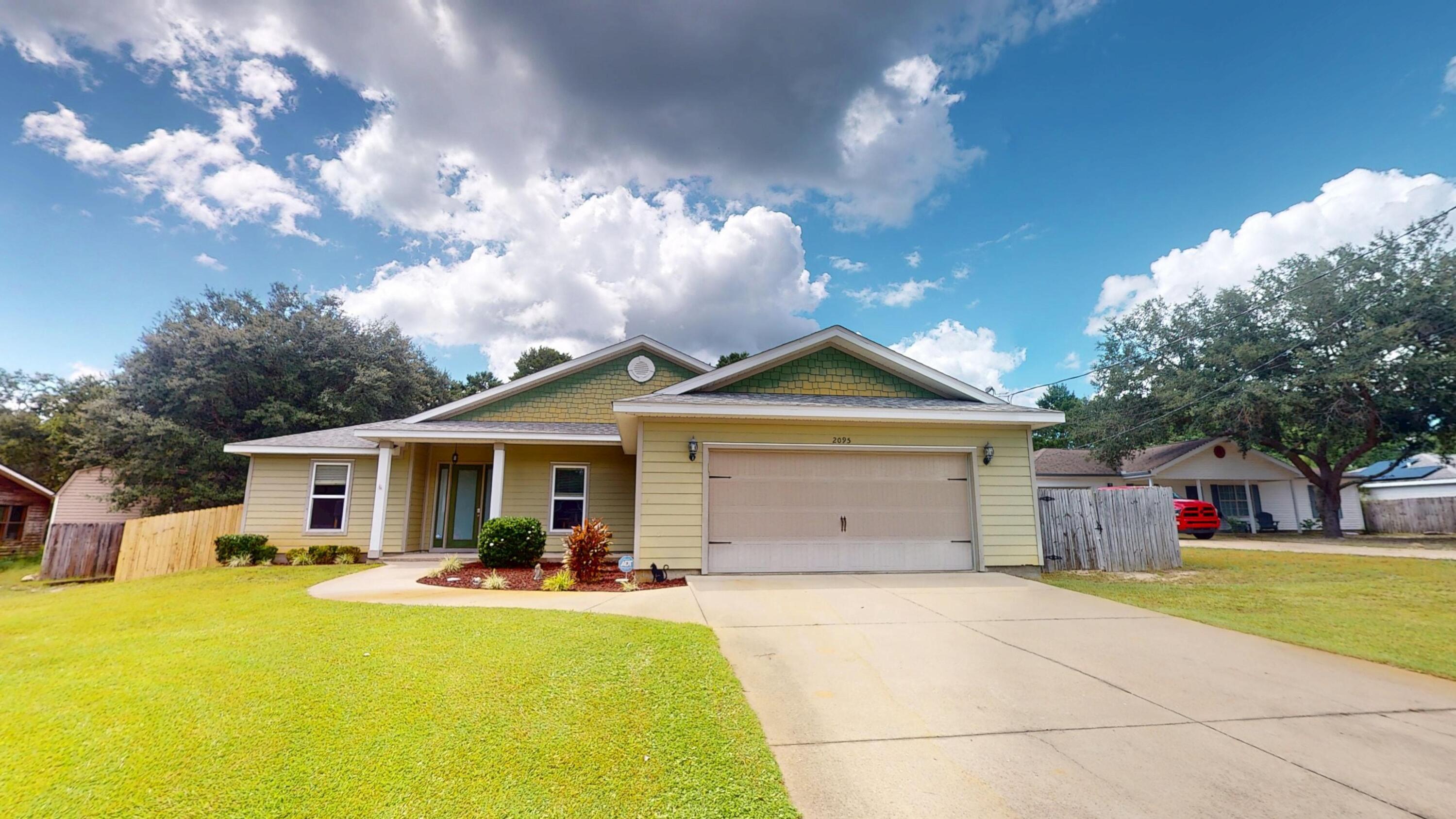 Welcome to the well-maintained 4-bedroom, 2-bath home offering 1930 square feet in a convenient Navarre location.  The open, comfortable floor plan features tray ceilings, recessed lighting, tile and carpet flooring, and a spacious living area with plenty of room to gather.  The kitchen offers granite countertops, stainless steel appliances, custom cabinetry, a pantry, breakfast bar and a sunny breakfast nook.  The primary suite provides a relaxing retreat with double vanities, a soaking tub, separate shower, and walk-in closets.  Step outside to a covered patio with a ceiling fan overlooking the large, privacy-fenced backyard.  There is plenty of space for entertaining, pets, play, or simply enjoying the Florida weather.  Centrally located in Navarre with convenient access to schools, shopping, dining, and the beautiful Gulf Coast beaches.  Schedule your private showing and see all this home has to offer.