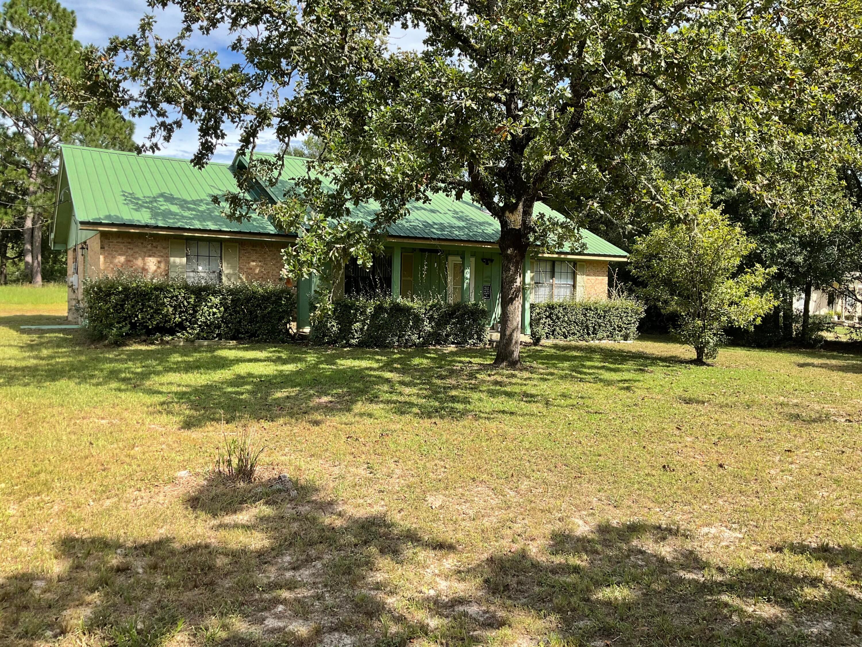 CALLING ALL INVESTORS OR FLIPPERS - BEING OFFERED ''AS IS'', this all-brick home on over 1/2 acre has plenty of possibilities.  1-car-garage with rear entry, covered back porch, new septic drain lines + newer HVAC unit, cathedral ceiling living room with fireplace. Seller has never occupied the home.