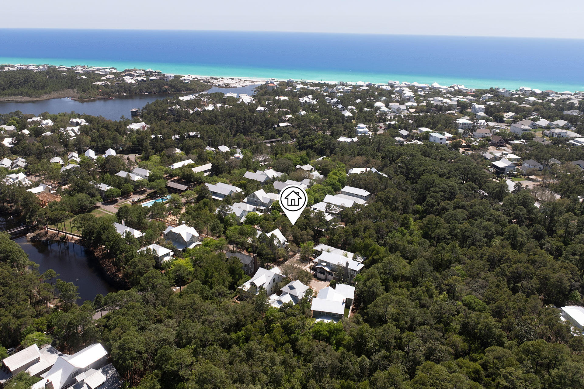Situated within the private, gated community of Forest Lakes along Scenic 30A, Lot 21 Okeechobee W presents an exceptional opportunity to build in one of the area's most desirable neighborhoods. This homesite includes approved plans for a well-designed residence featuring four bedrooms, four and a half bathrooms, 2,286 square feet of heated and cooled space, and 2,626 square feet of total living area. Ideally positioned within walking distance of the community pool and park, this lot provides both convenience and a tranquil setting. Less than a mile from Gulfview Heights Regional Beach Access, residents enjoy easy access to the sugar-white sand beaches and emerald Gulf waters. The neighborhood sits at one of the highest elevation points along the Gulf, offering a peaceful and elevated living experience. Forest Lakes is known for its Southern Craftsman architecture and exceptional amenities, including a seasonally heated two-tiered pool, a pavilion with an outdoor kitchen, and a scenic lake stocked for catch-and-release fishing. Surrounded by lush green spaces and walking paths, the community offers a picturesque setting with a strong connection to nature. With only 150 homesites and close proximity to Point Washington State Forest, Forest Lakes provides a unique blend of privacy, beauty, and convenience.