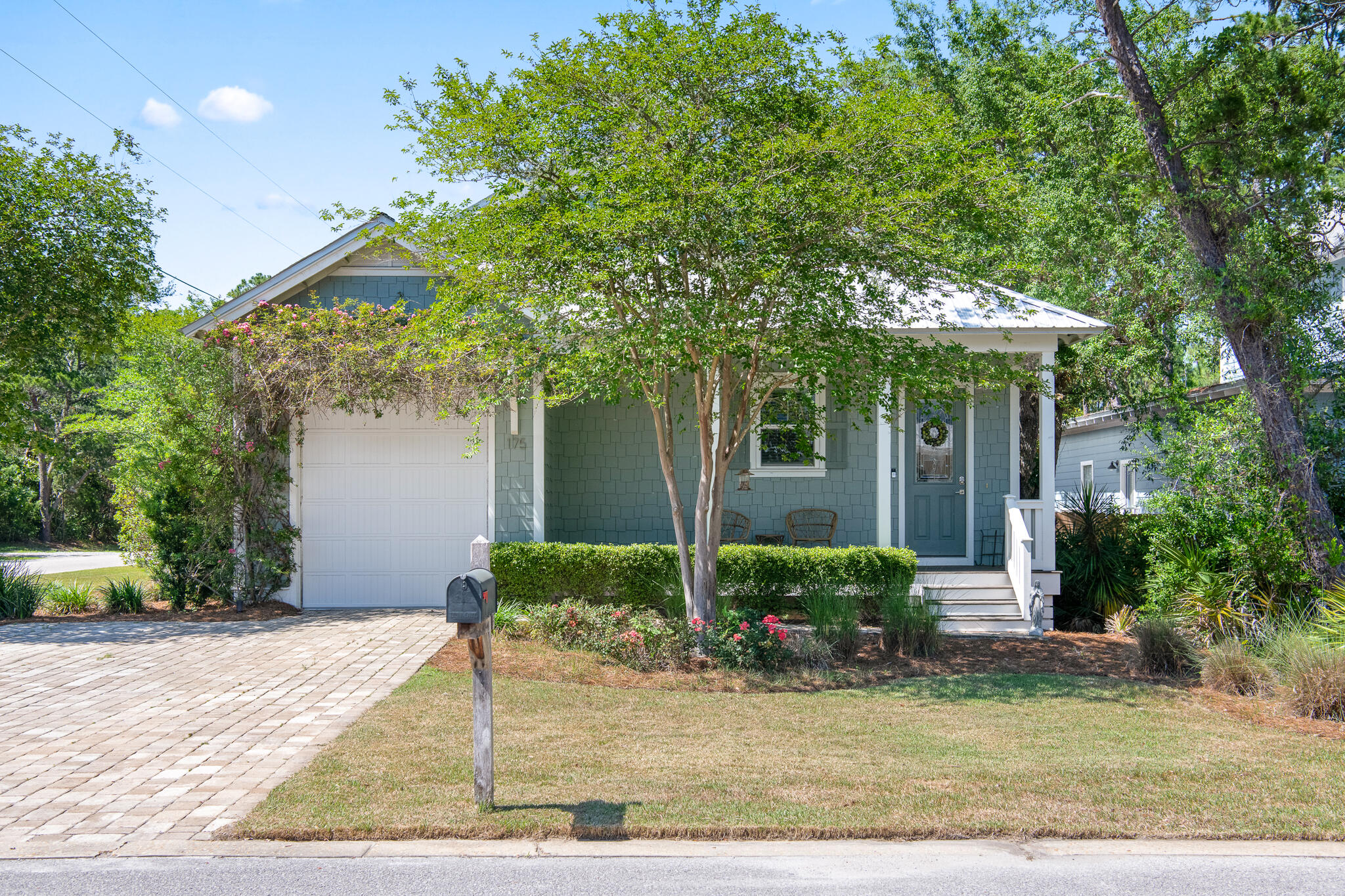 Situated on a corner lot in the highly sought after Point Washington neighborhood of Magnolia Beach / Grayton Bayou, 175 Greenbriar Lane checks all the boxes! This custom home offers an open concept layout with top tier finishes, gourmet kitchen, spacious living areas perfect for entertaining, and a garage. No detail was spared from vaulted ceilings, custom shiplap, large island and spa-like primary ensuite. The backyard features mature landscape with private entertaining space and invaluable side access for parking, RV storage, or an additional space to park your boat! There is more than enough room to build a pool if desired. This home is conveniently located in a family-friendly neighborhood, just steps to a boat ramp & a public park, and has no HOA.