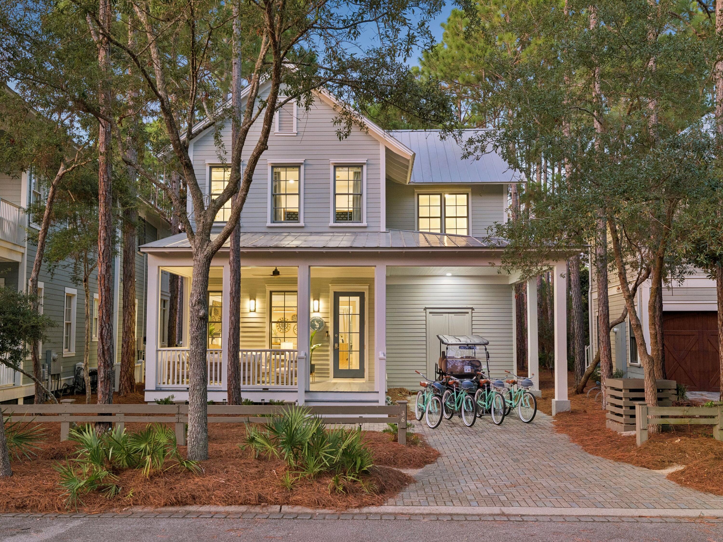A refined expression of coastal living, this newly renovated and furnished four-bedroom, four-and-a-half-bath, 2,393-sq.-ft. residence sits in WaterColor's coveted Phase II. Surrounded by mature pines and offered fully furnished with an included golf cart, the home pairs sophisticated interiors with inviting outdoor spaces and room to add a private pool. Inside, light-filled living spaces are grounded by warm reclaimed pine flooring, crisp white cabinetry, and a soft, understated coastal palette. The chef's kitchen serves as the centerpiece with a generous quartz island, custom cabinetry, open shelving, and hand-set herringbone tile, flowing seamlessly into the dining and living areas for effortless everyday living and entertaining.

The main-level primary suite offers a private retreat with dual vanities and a glass-enclosed shower with dual rain showerheads. Three additional bedrooms upstairs, each with a private bath, provide comfortable accommodations for family and guests.

A screened porch overlooks the mature pine setting, while a paved patio with fire pit creates an additional gathering space. The generous outdoor area also offers the opportunity to add a private pool and further enhance the home's indoor-outdoor living.

Ideally located just steps from a neighborhood pocket park and Camp WaterColor, the home offers convenient access to the beach club, neighborhood pools, Camp WaterColor's lazy river and playgrounds, and the boutiques and restaurants along Scenic Highway 30A. Turnkey and thoughtfully updated, this residence captures the relaxed sophistication and distinctive character of the WaterColor lifestyle.